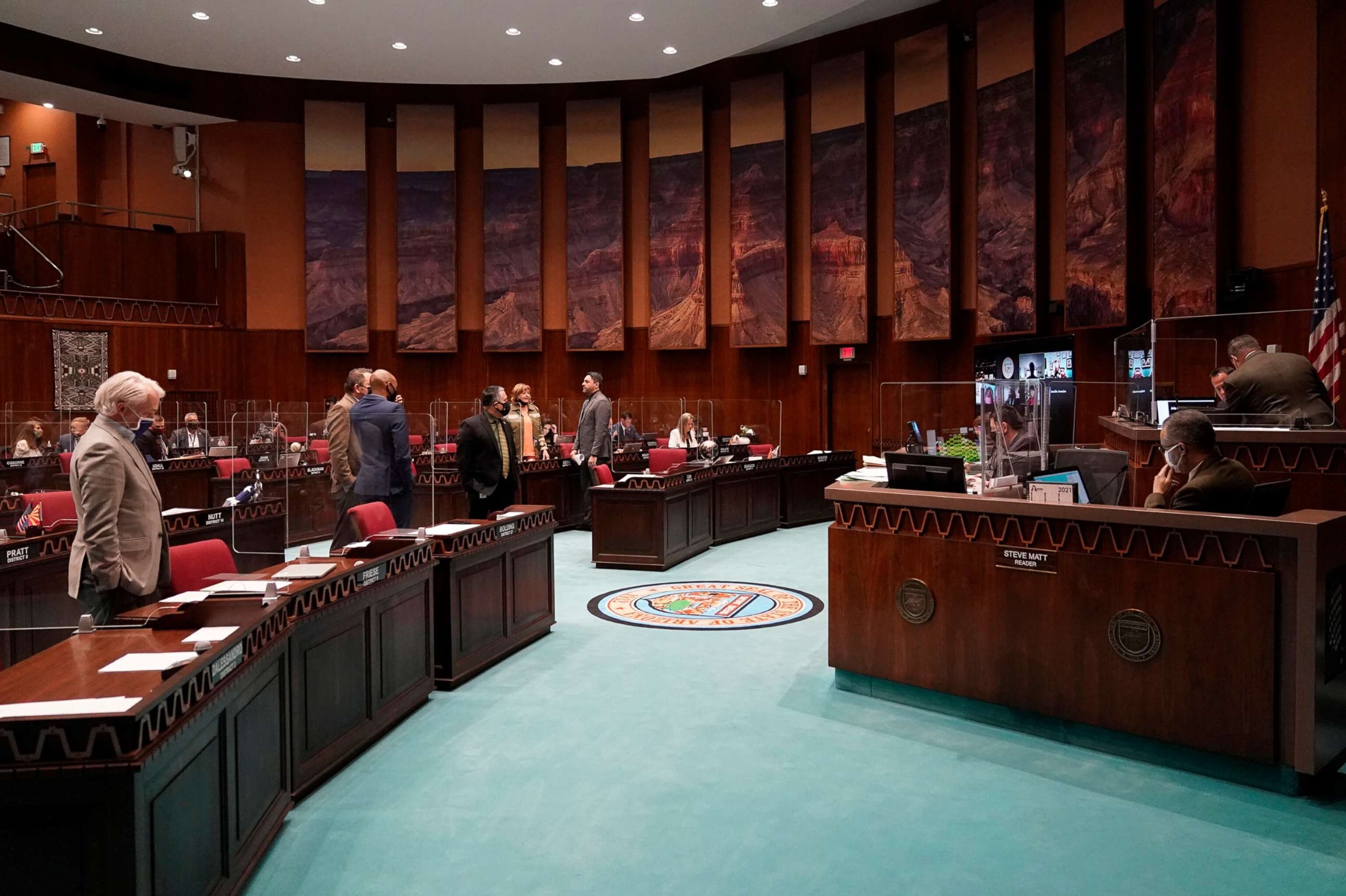 PHOTO: In this Feb. 18, 2021, file photo, state representatives gather at the Capitol, in Phoenix.