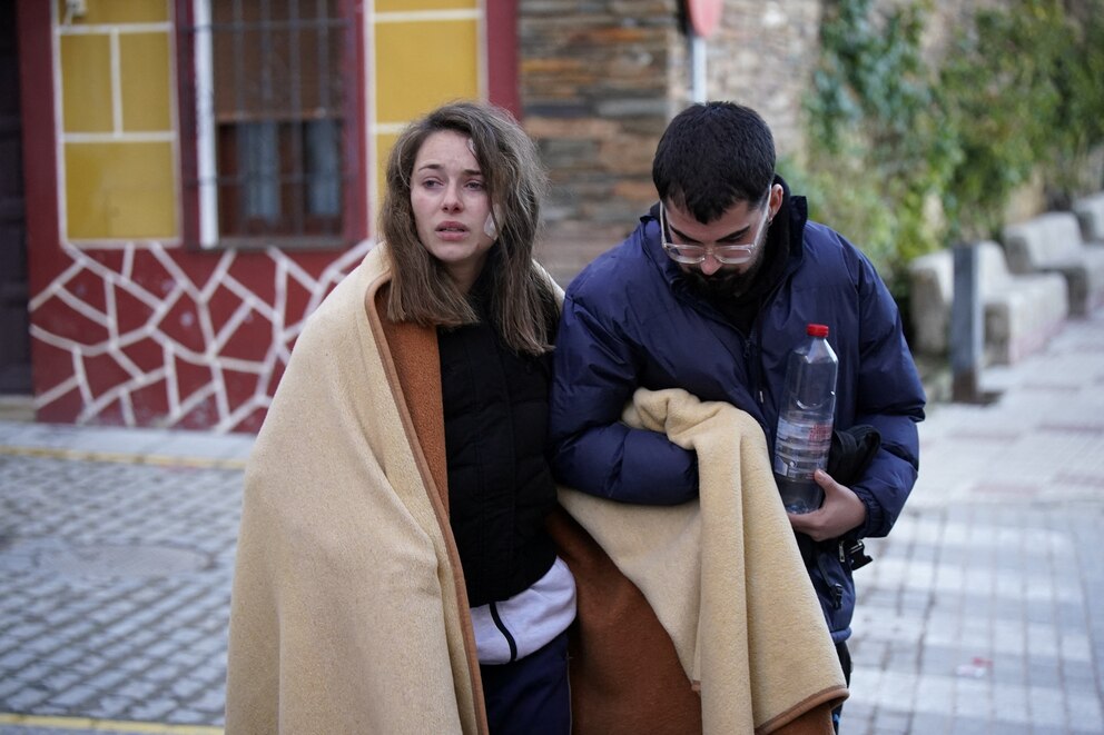 PHOTO: Ana, one of the victims of a deadly derailment of two high-speed trains, looks on at while seeking her missing dog, which travelled with her and her sister, now hospitalized, during the accident near Adamuza, in Cordoba, Spain, Jan. 9, 2026.