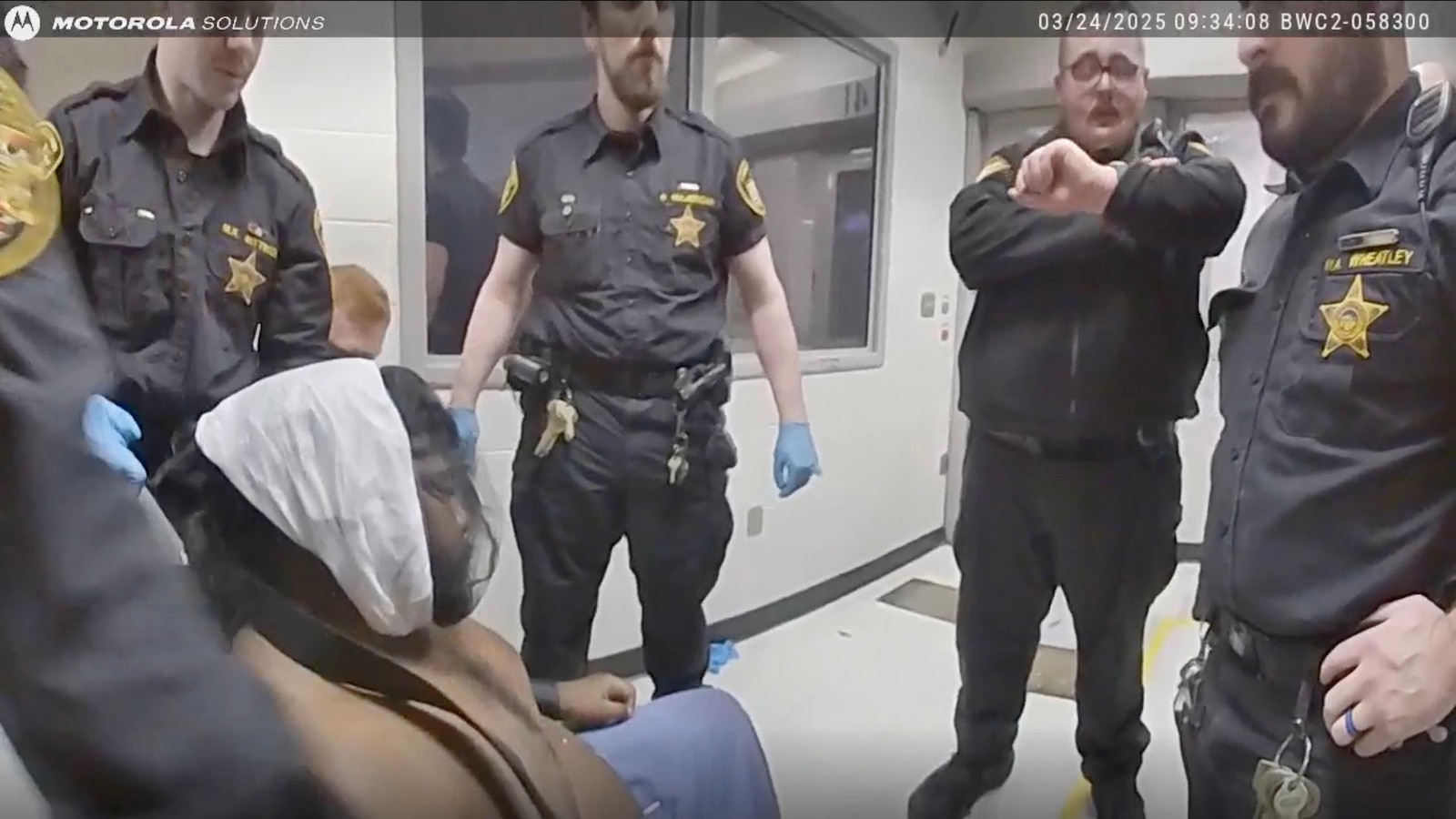 Ohio county agrees to $7M settlement over man's death after jail guards restrained him, family says