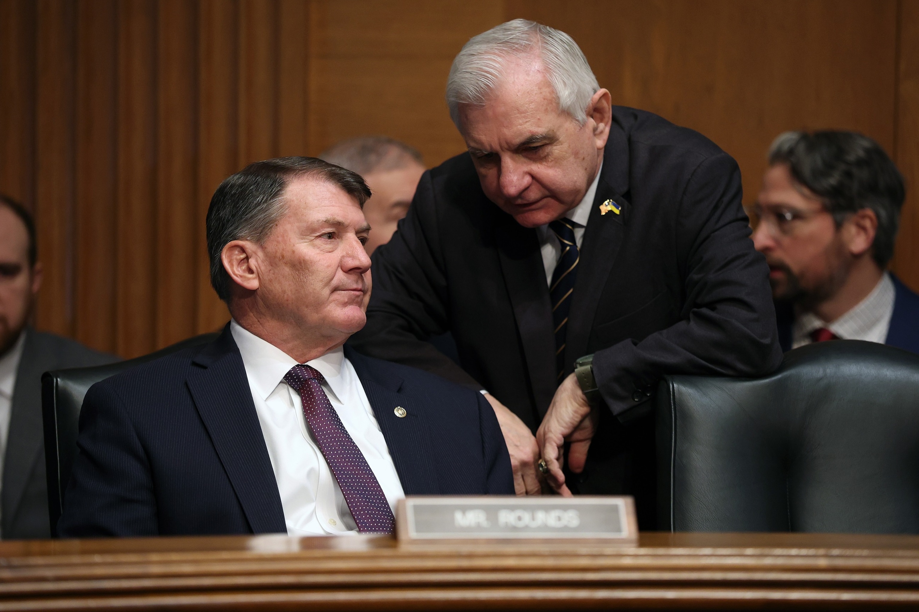 PHOTO: Sen. Jack Reed talks to Sen. Mike Rounds during a Senate Committee on Banking, Housing, and Urban Affairs hearing, February 05, 2026 in 