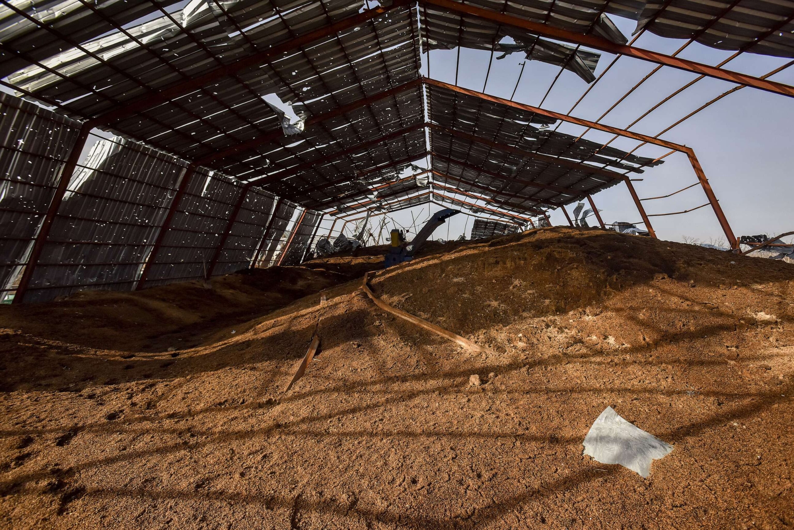 PHOTO: A damaged grain storage at a destroyed farm in Bohorodychne, Donetsk region, eastern Ukraine, Feb. 24, 2023.