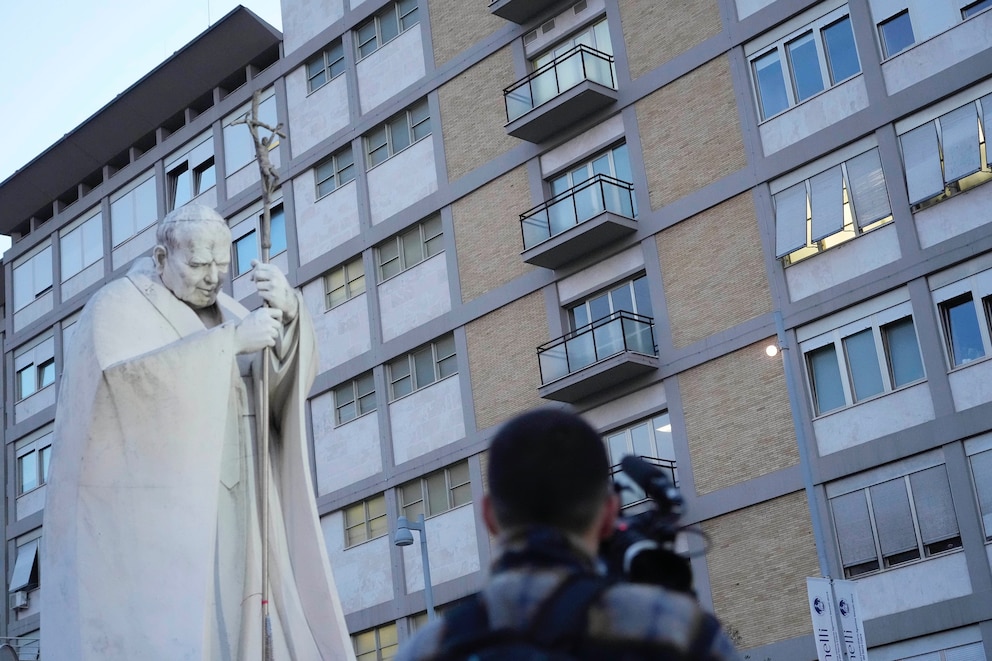 PHOTO: A video journalists films the Agostino Gemelli Polyclinic in Rome, Sunday, Feb. 23, 2025, where Pope Francis  is hospitalized since Feb. 14. 