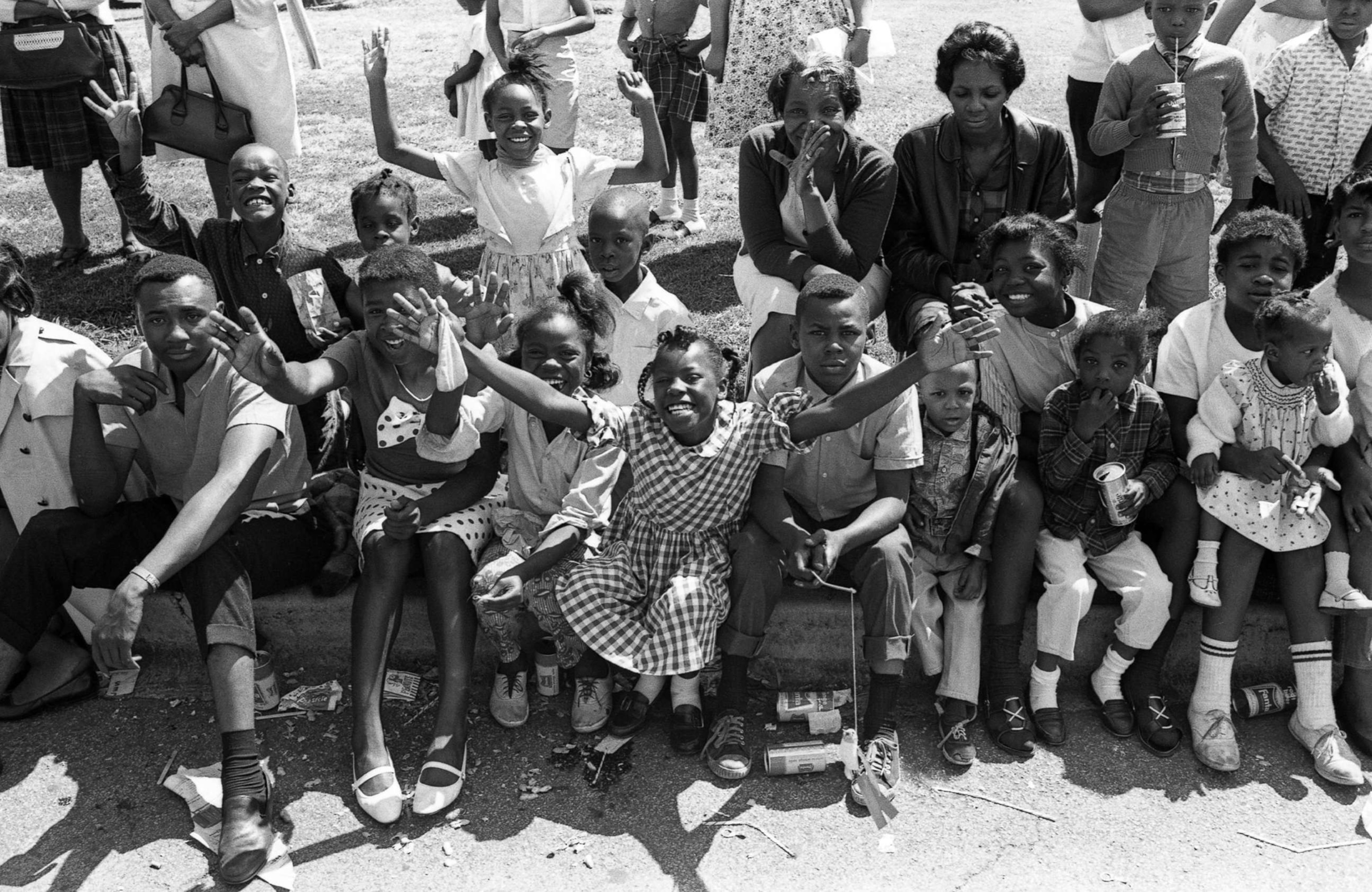 PHOTO: Crowds line up along the street to watch the Bud Billiken Day parade, Chicago, in 1967. 