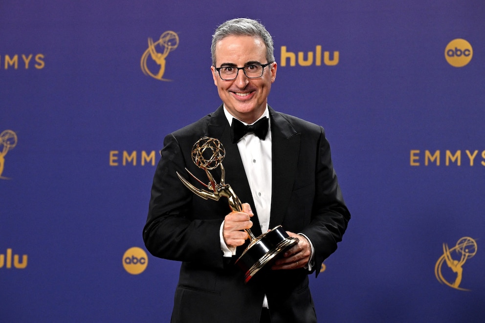 PHOTO: John Oliver, winner of the Outstanding Scripted Variety Series Award for "Last Week Tonight with John Oliver", poses in the press room during the 76th Emmy Awards at the Peacock Theatre at L.A. Live in Los Angeles on September 15, 2024. 