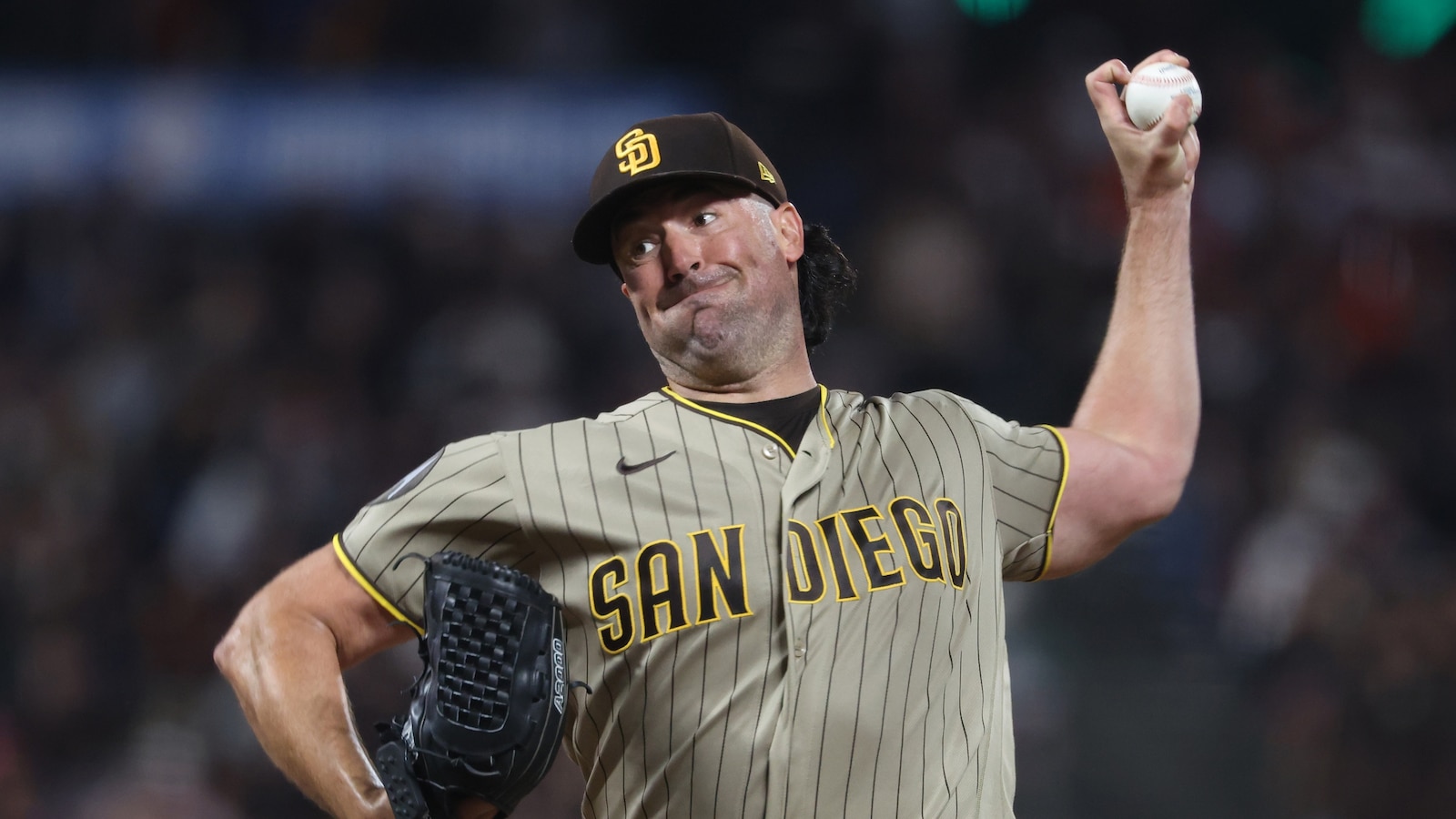 Ray gets 100th career win as Padres hold off Giants 7-5 to maintain wild-card edge
