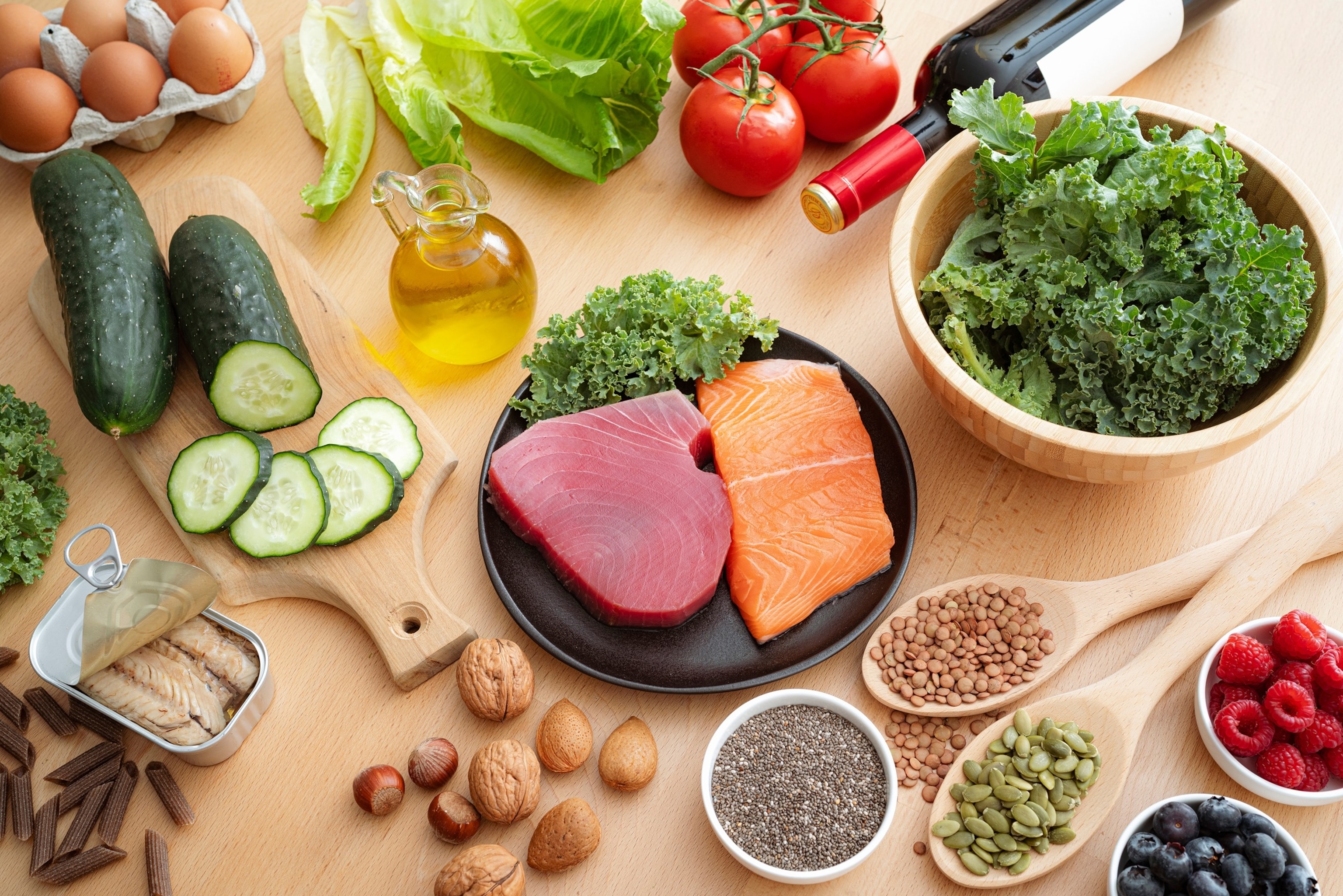 PHOTO: MIND diet ingredients on the kitchen table. Food rich in antioxidants to reduce dementia and brain failure risks. Brain-healthy dieting plan. Combination of Mediterranean and DASH diet.