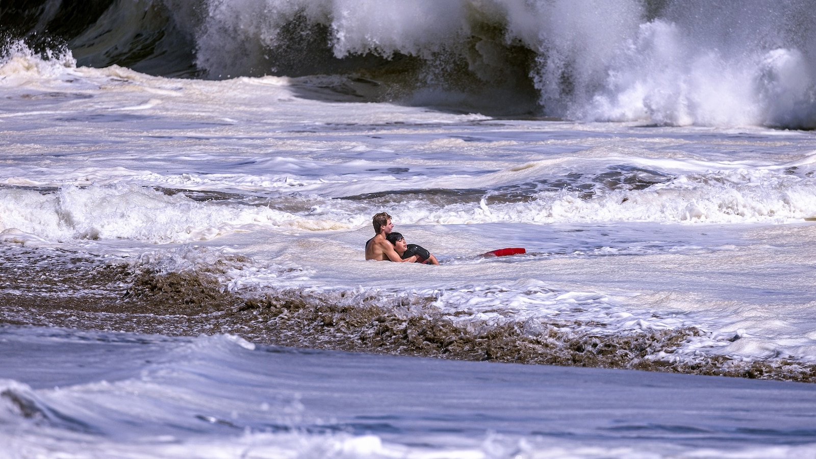 The 16-year-old lifeguard who was captured on camera pulling a young boy to the shore off the coast of California over the weekend is speaking out for the first