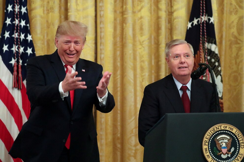 PHOTO: President Donald Trump jokingly urges Senator Lindsey Graham and fellow senators to return to the Capitol to vote for more judge nominees during an event to celebrate federal judicial confirmations at the White House in Washington, Nov. 6, 2019.