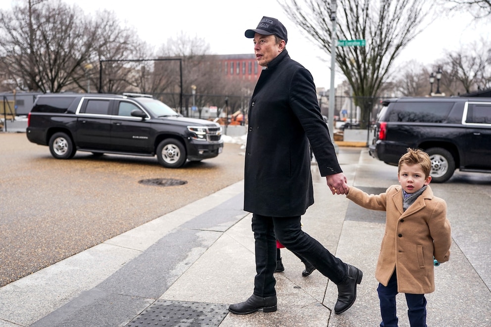 PHOTO: Elon Musk walks with his son X ÃA-12  ahead of a meeting with Indian Prime Minister Narendra Modi at Blair House, in Washington, Feb. 13, 2025.