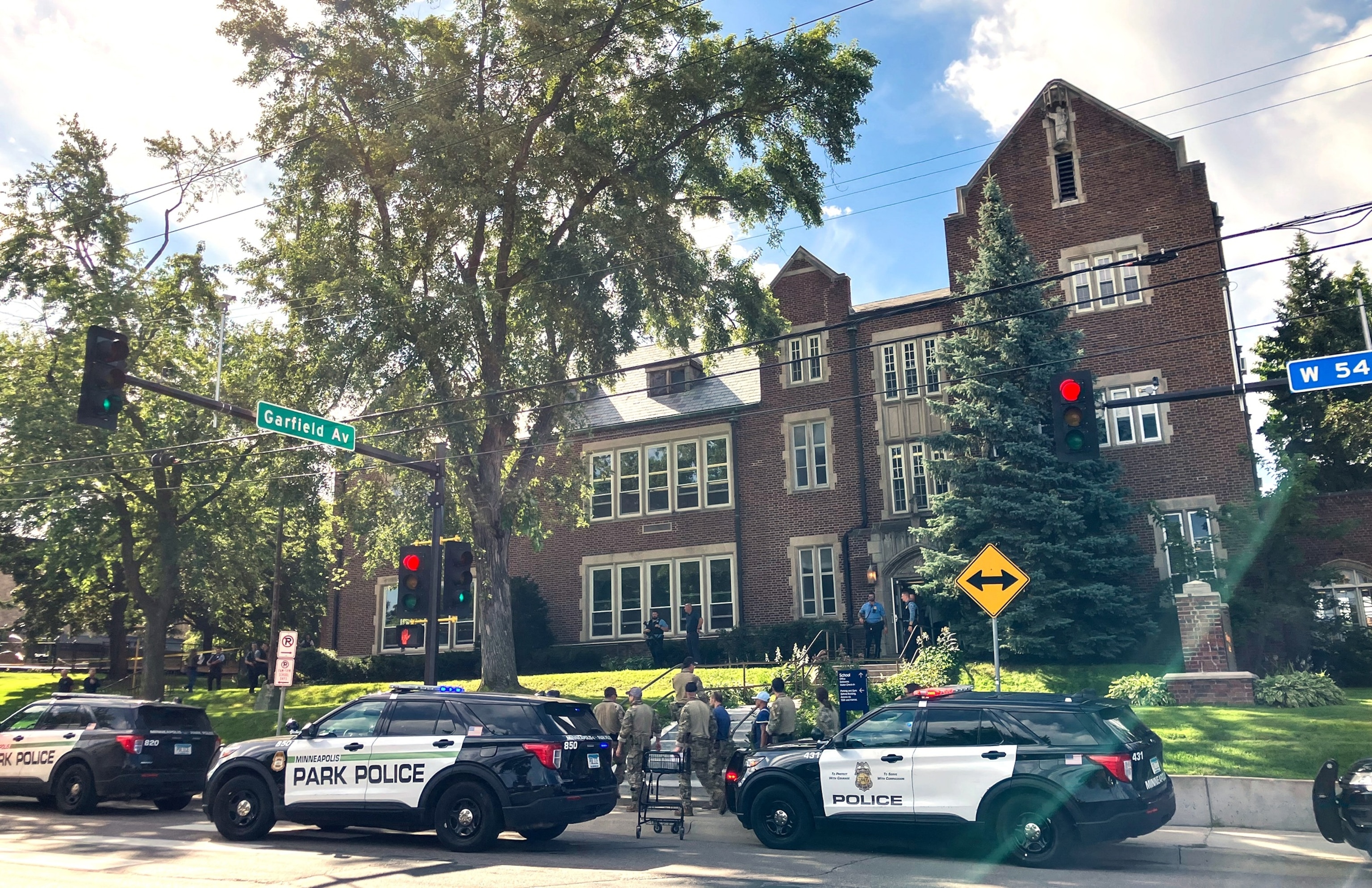 PHOTO: Police and first responders work at the scene of a shooting near Annunciation Church and Catholic School in Minneapolis, Minneosta, on Aug. 27, 2025. 