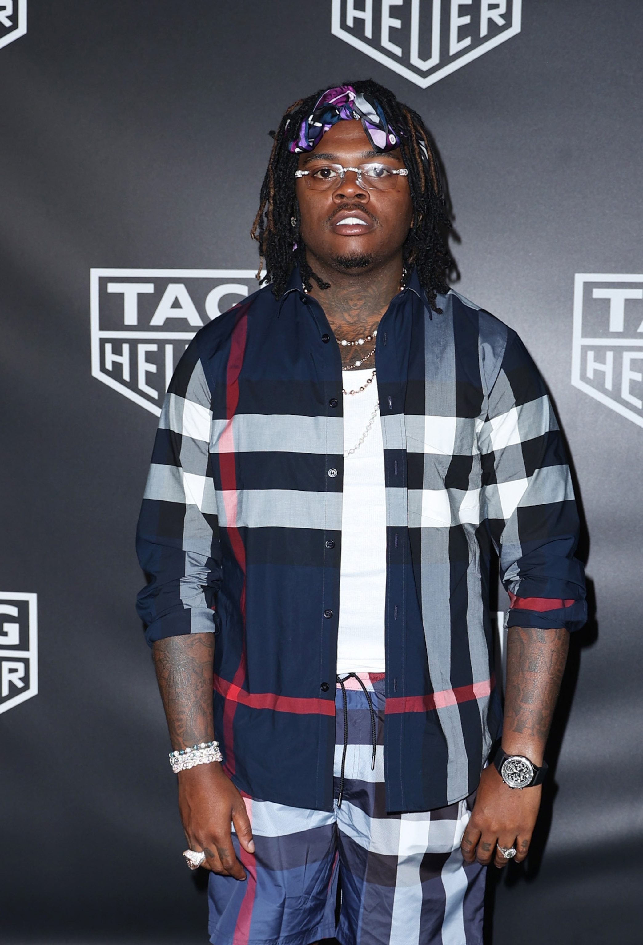 PHOTO: Gunna attends the TAG Heuer Miami Prix at Jungle Plaza on May 7, 2022 in Miami, Florida.