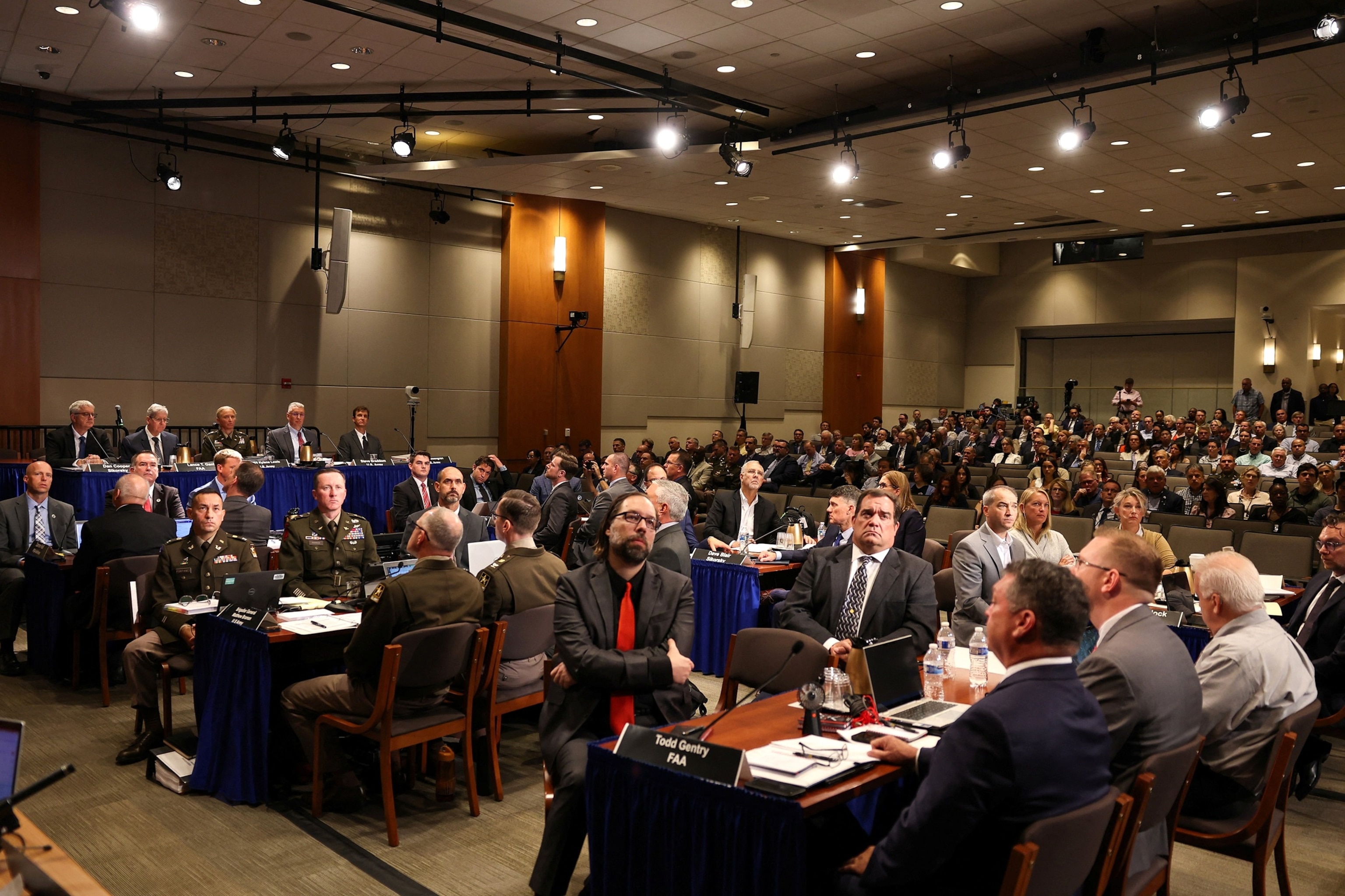 PHOTO: A National Transportation Safety Board (NTSB) investigative hearing on the January 29 mid-air collision takes place at NTSB headquarters in Washington, D.C., July 30, 2025.