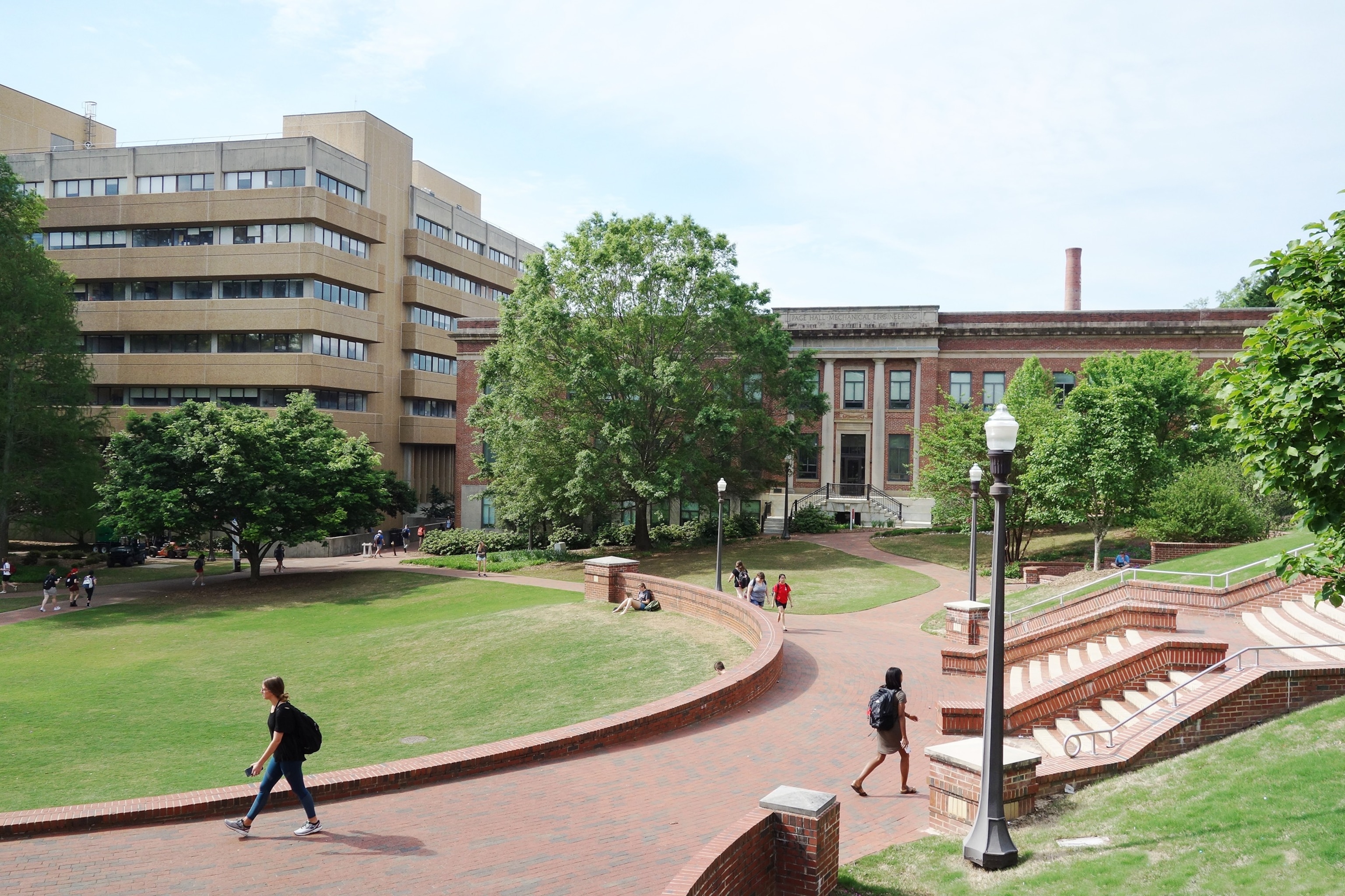 PHOTO: College students walk on a University campus. 