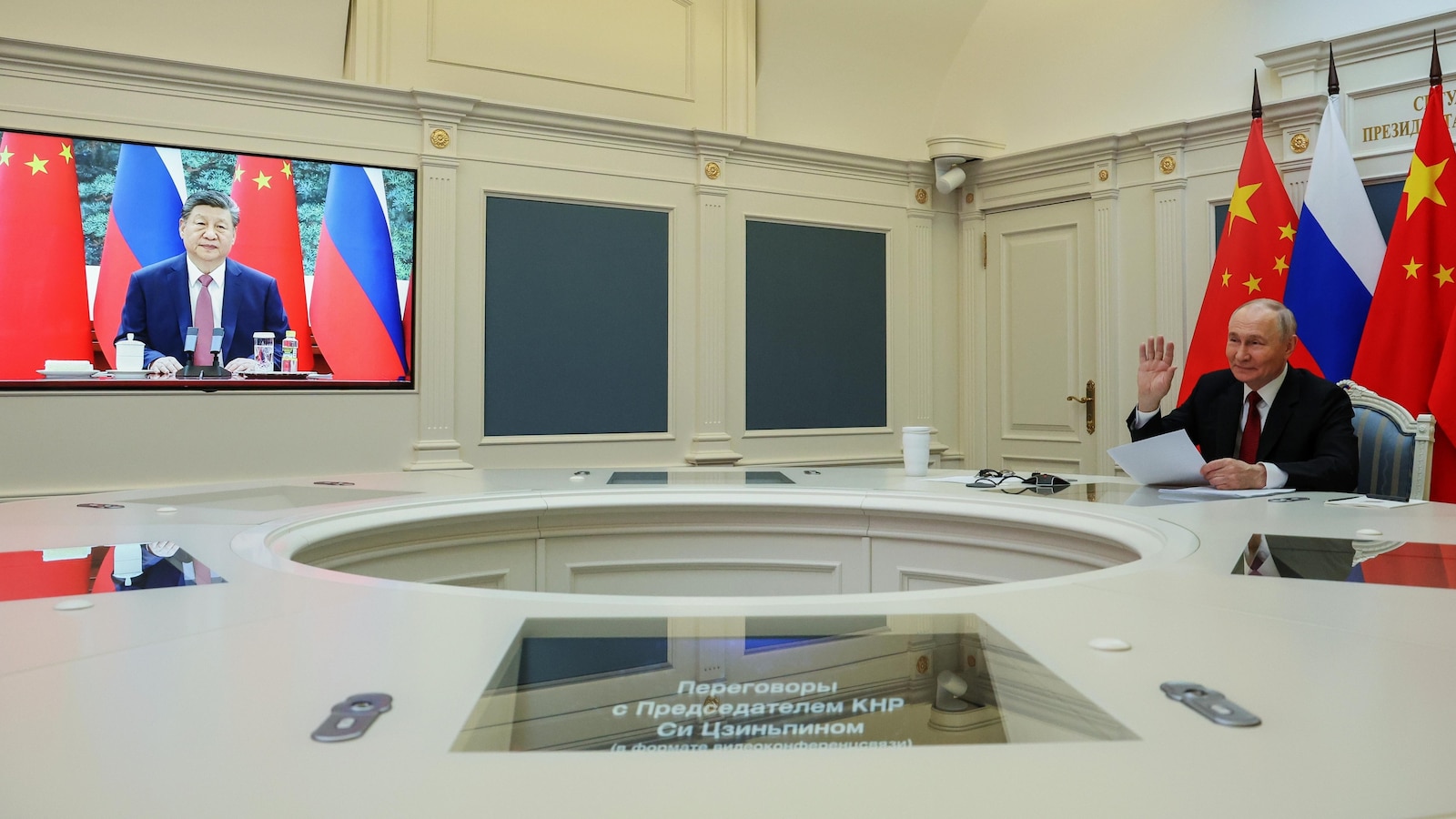 China's Xi and Russia's Putin reinforce ties in video call