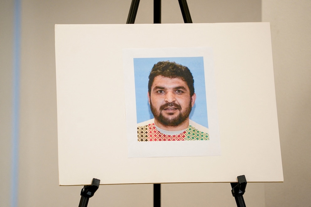 PHOTO: A picture of Rahmanullah Lakanwal, an Afghan national who is the suspect in the shooting of two National Guard members, is displayed at a press conference in Washington, D.C., Nov. 27, 2025. 