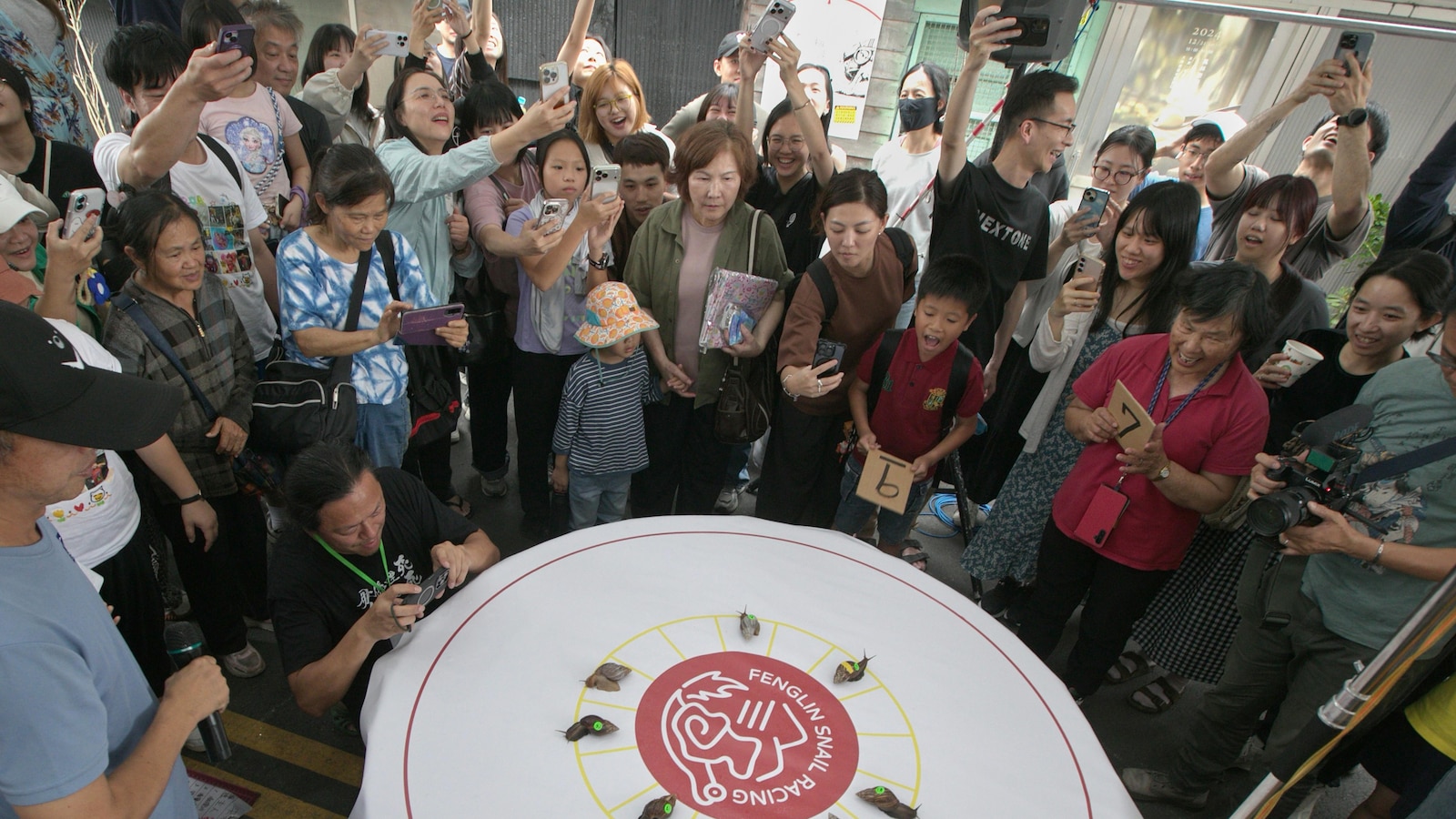 A Taiwanese town embraces a slow pace of life through a snail race