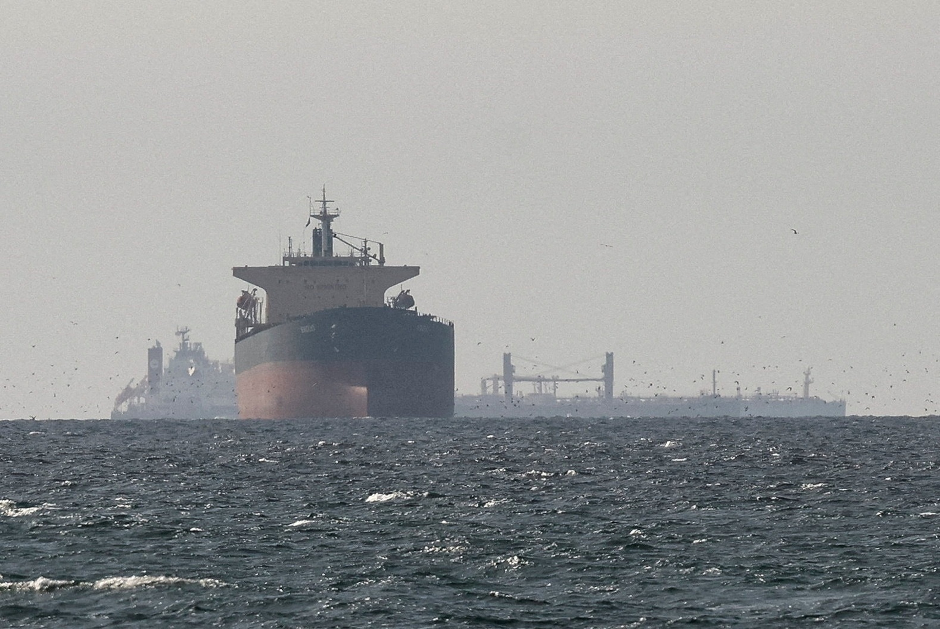 PHOTO: FILE PHOTO: Tankers sail in the Gulf, near the Strait of Hormuz
