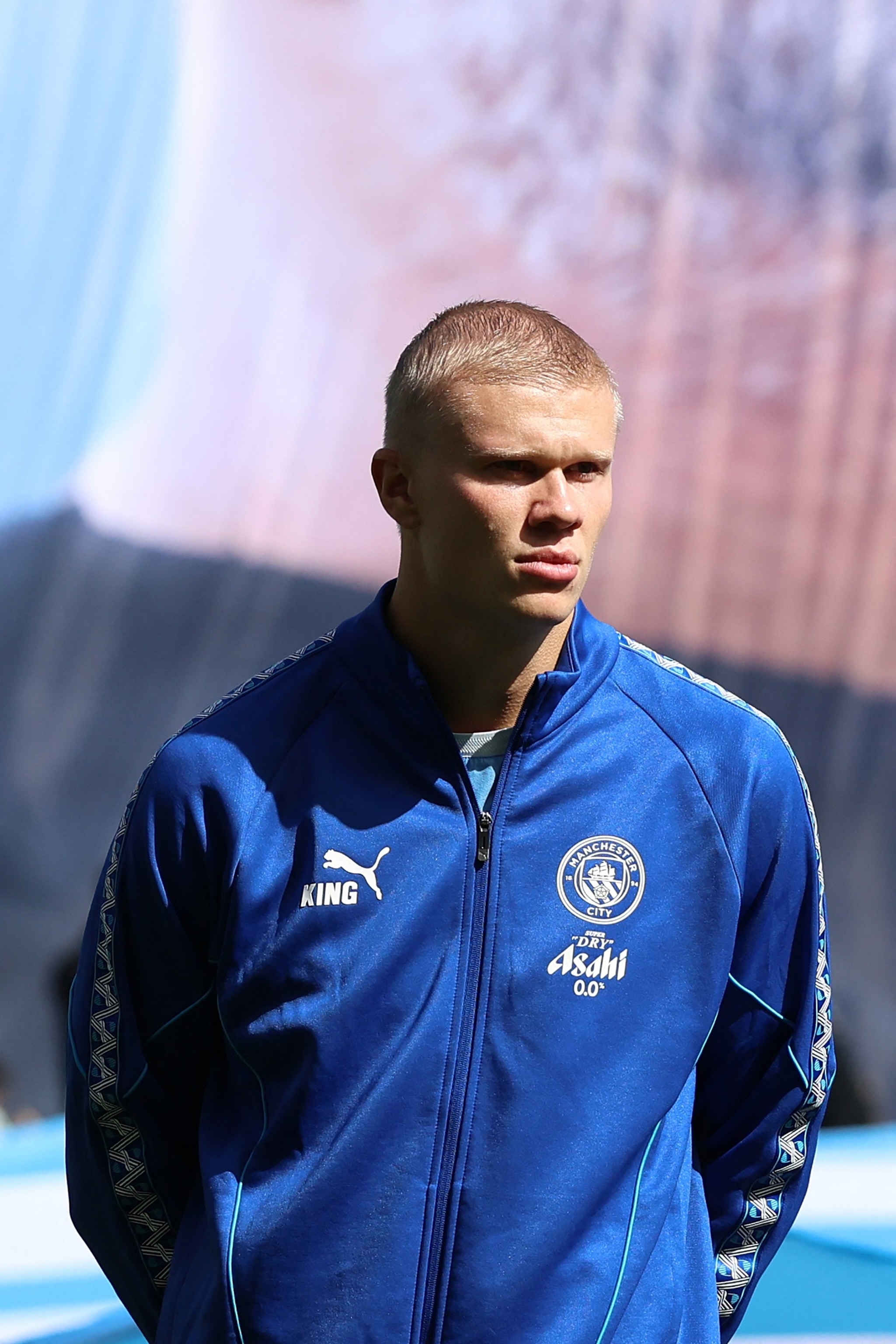 Manchester City's Norwegian striker #09 Erling Haaland, sporting a new hair cut, lines up ahead of the English Premier League football match between Manchester City and AFC Bournemouth on August 23, 2026.