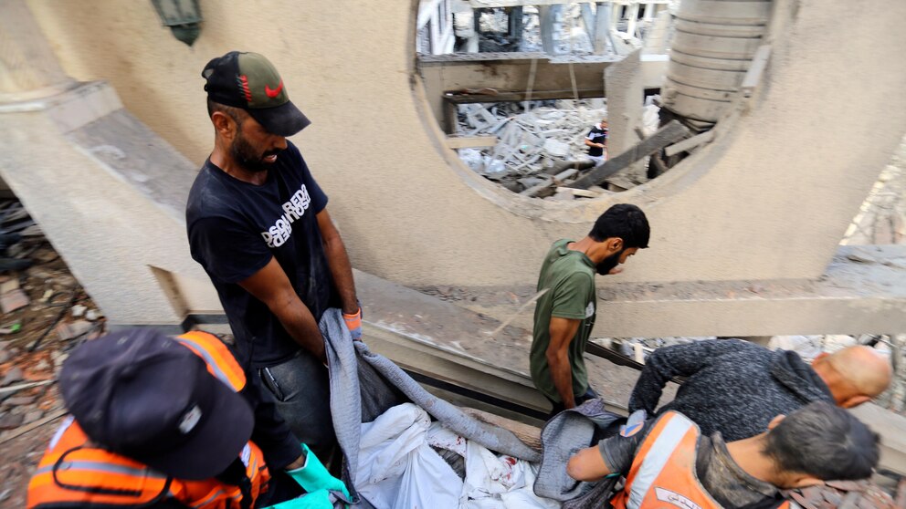 Gaza awaits aid from Egypt as Israel readies troops for ground assault