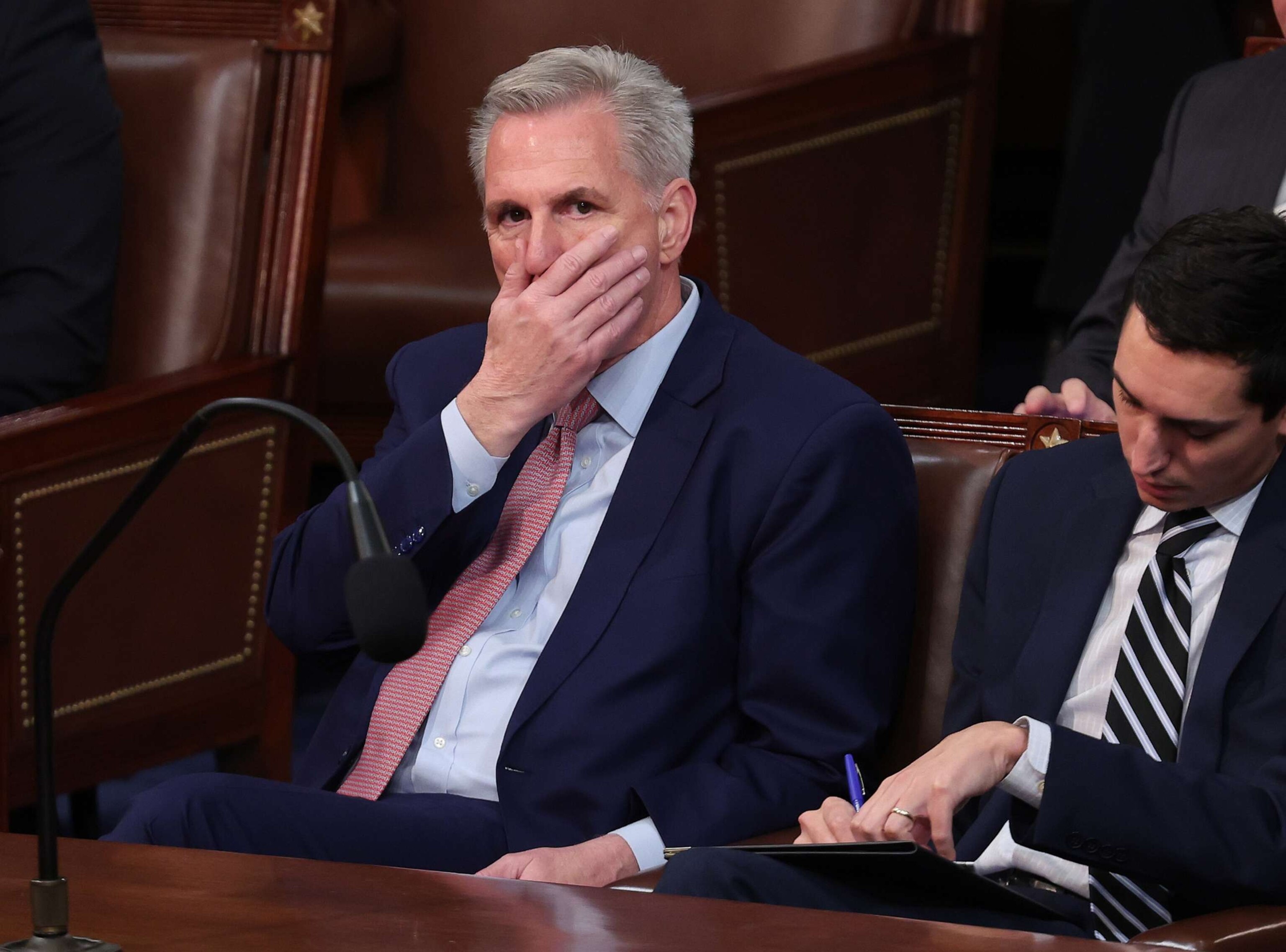 PHOTO: House Minority Leader Kevin McCarthy listens as Representatives cast their votes for Speaker of the House on the first day of the 118th Congress in the House Chamber of the U.S. Capitol, Jan. 3, 2023, in Washington