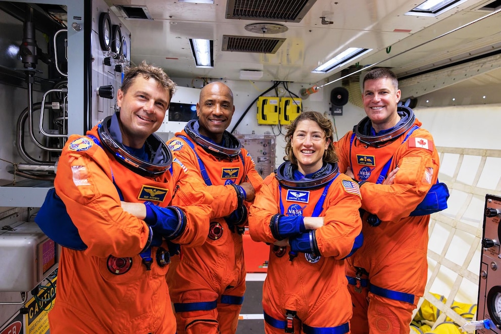 PHOTO: In this Sept. 20, 2023, file photo, members of the Artemis II crew stand in the white room on the crew access arm of the mobile launcher at Launch Pad 39B as part of an integrated ground systems test at Kennedy Space Center in Florida.