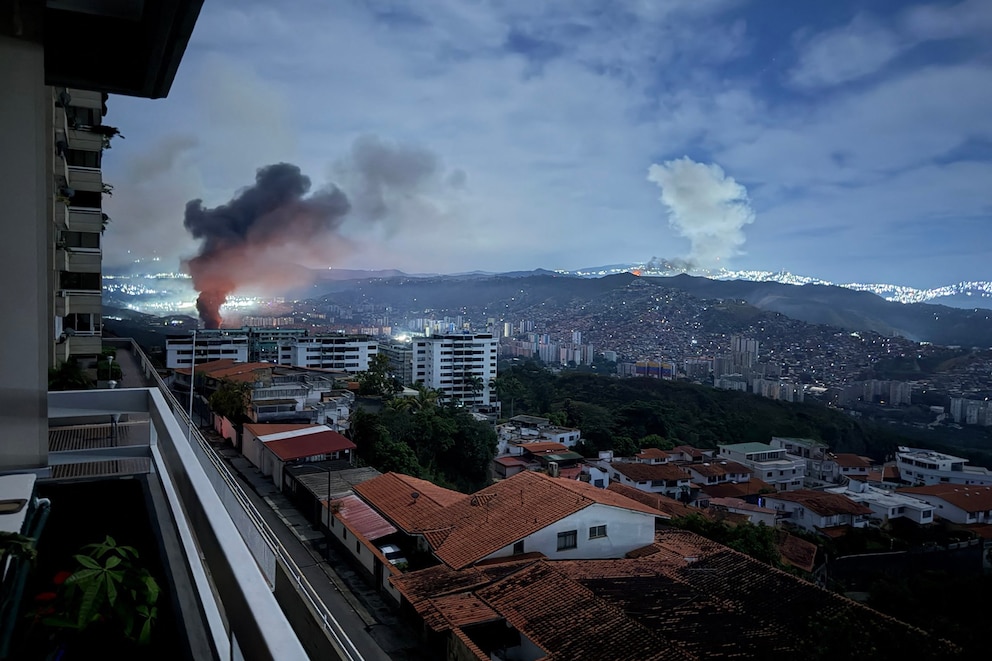 PHOTO: Smoke billows over Caracas after a series of explosions part of a US military operation that led to the capture of Venezuelan President Nicolas Maduro.