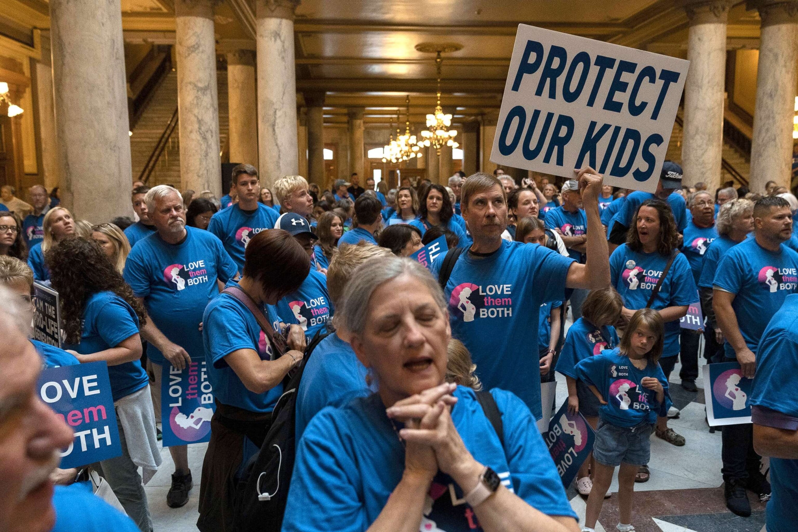 PHOTO: Anti-abortion demonstrators protest during a special session of the Indiana State Senate at the Capitol building in Indianapolis, on July 26, 2022. 