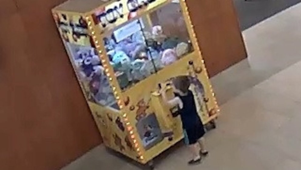 Child rescued after climbing into a claw machine arcade game