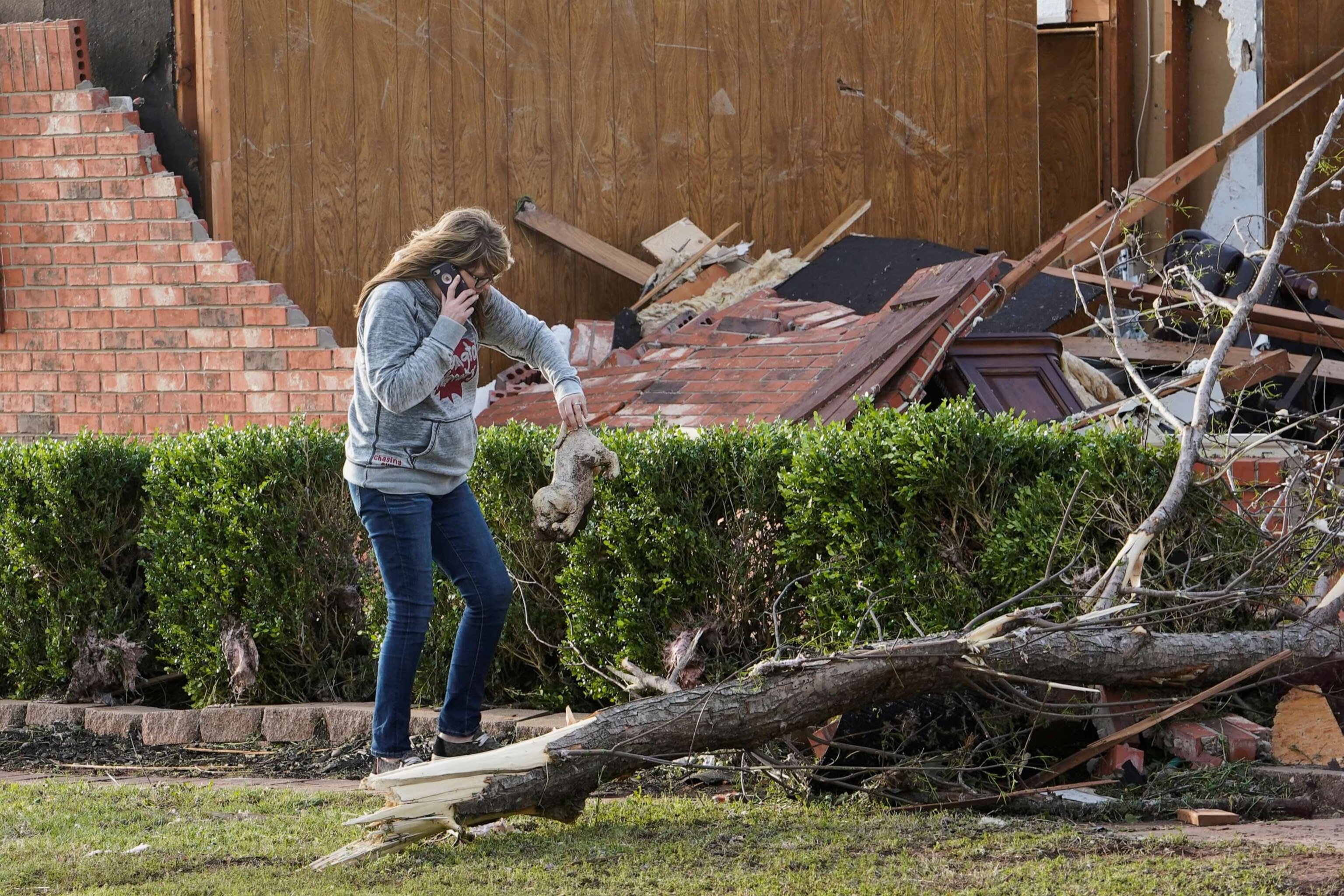 PHOTO: Robbie Bridwell surveys damage after overnight tornadoes in Cole, Okla., April 20, 2023.