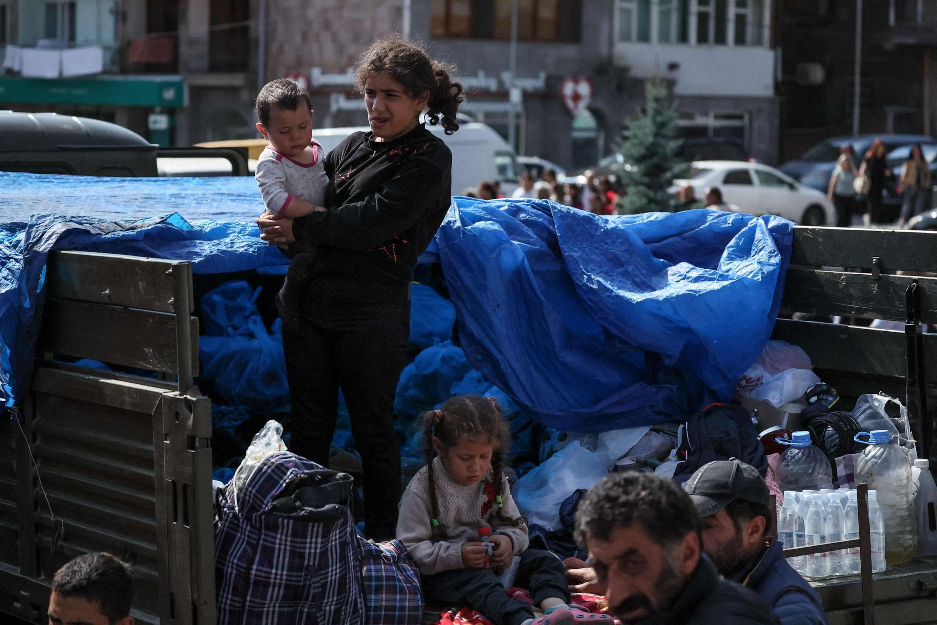 PHOTO: Armenian refugees wait in a square of Goris city centre on Sept. 29, 2023 before being evacuated in various Armenian cities.