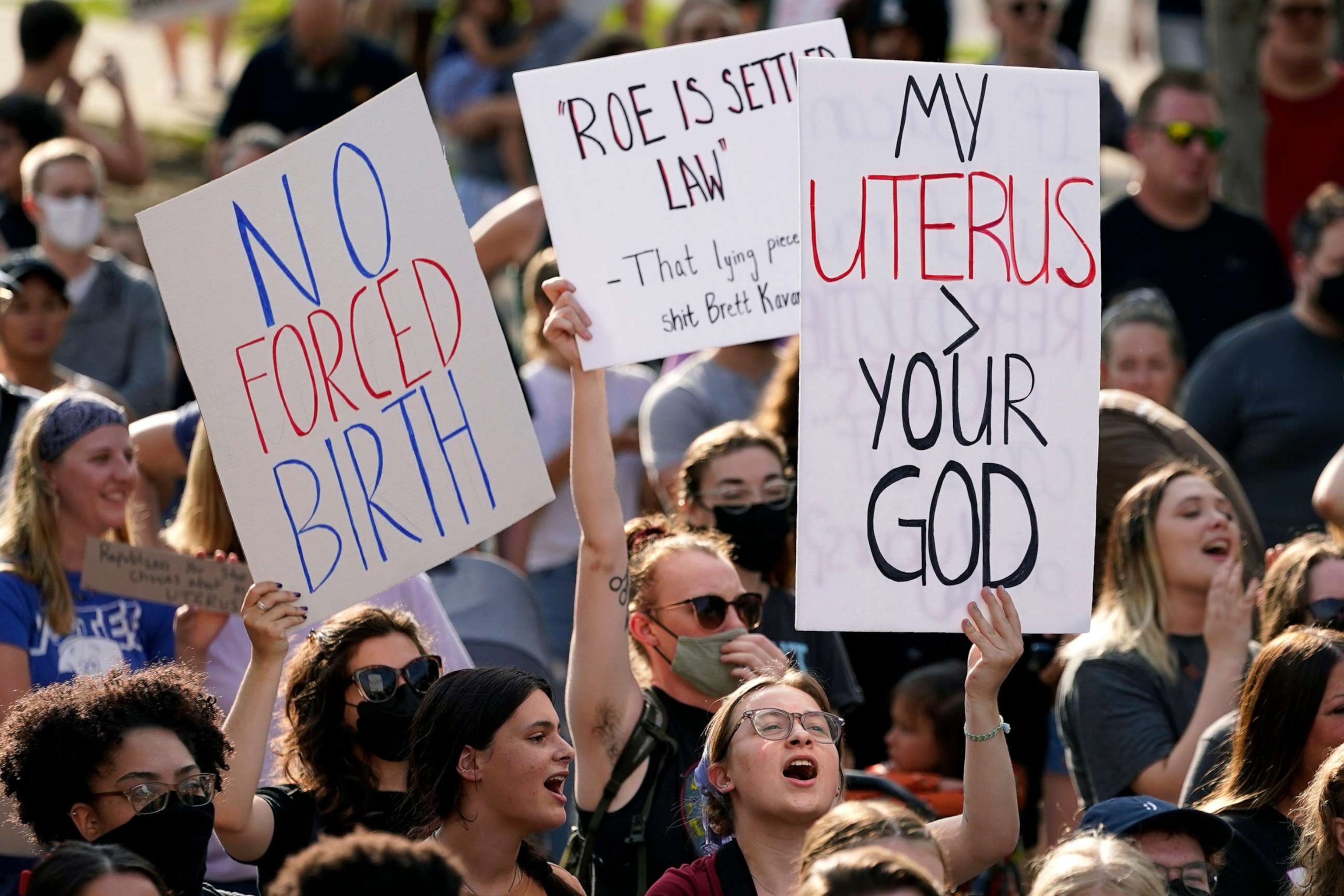 PHOTO: Abortion-rights protesters cheer at a rally, June 24, 2022, in Des Moines, Iowa.