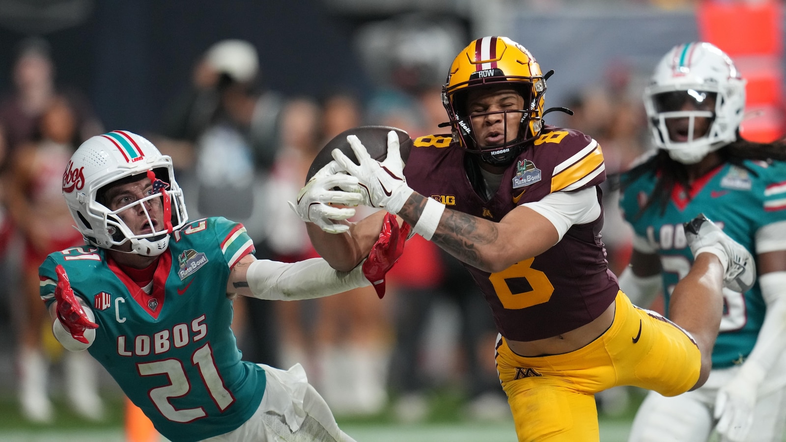 Smith's diving TD catch in overtime sends Minnesota to 20-17 win over New Mexico in Rate Bowl