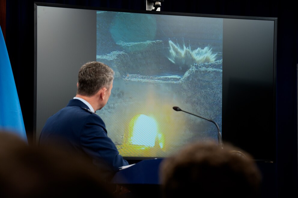 PHOTO: Chairman of the Joint Chiefs of Staff Air Force Gen. Dan Caine turns to watch a video of a bombing test of the GBU-57A/B Massive Ordnance Penetrator during a news conference at the Pentagon, June 26, 2025, in Arlington, Virginia. 