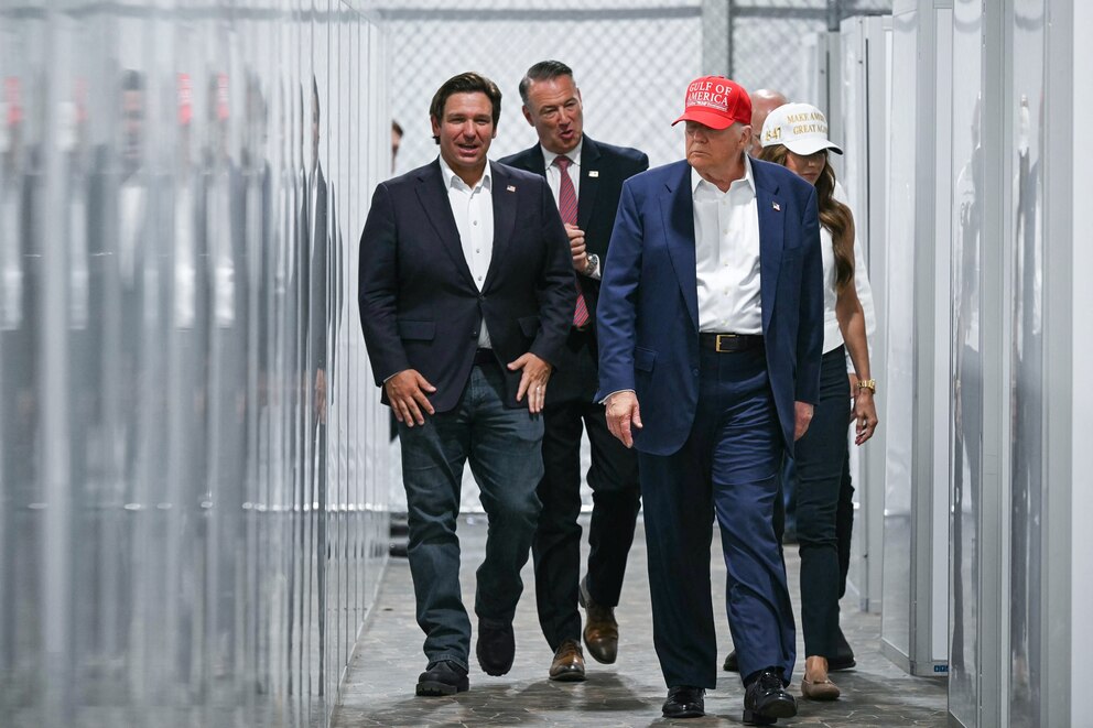 PHOTO: President President Donald Trump, Florida Governor Ron DeSantis, and Secretary of Homeland Security Kristi Noem tour a migrant detention center, dubbed "Alligator Alcatraz,"  in Ochopee, Fla., July 1, 2025.