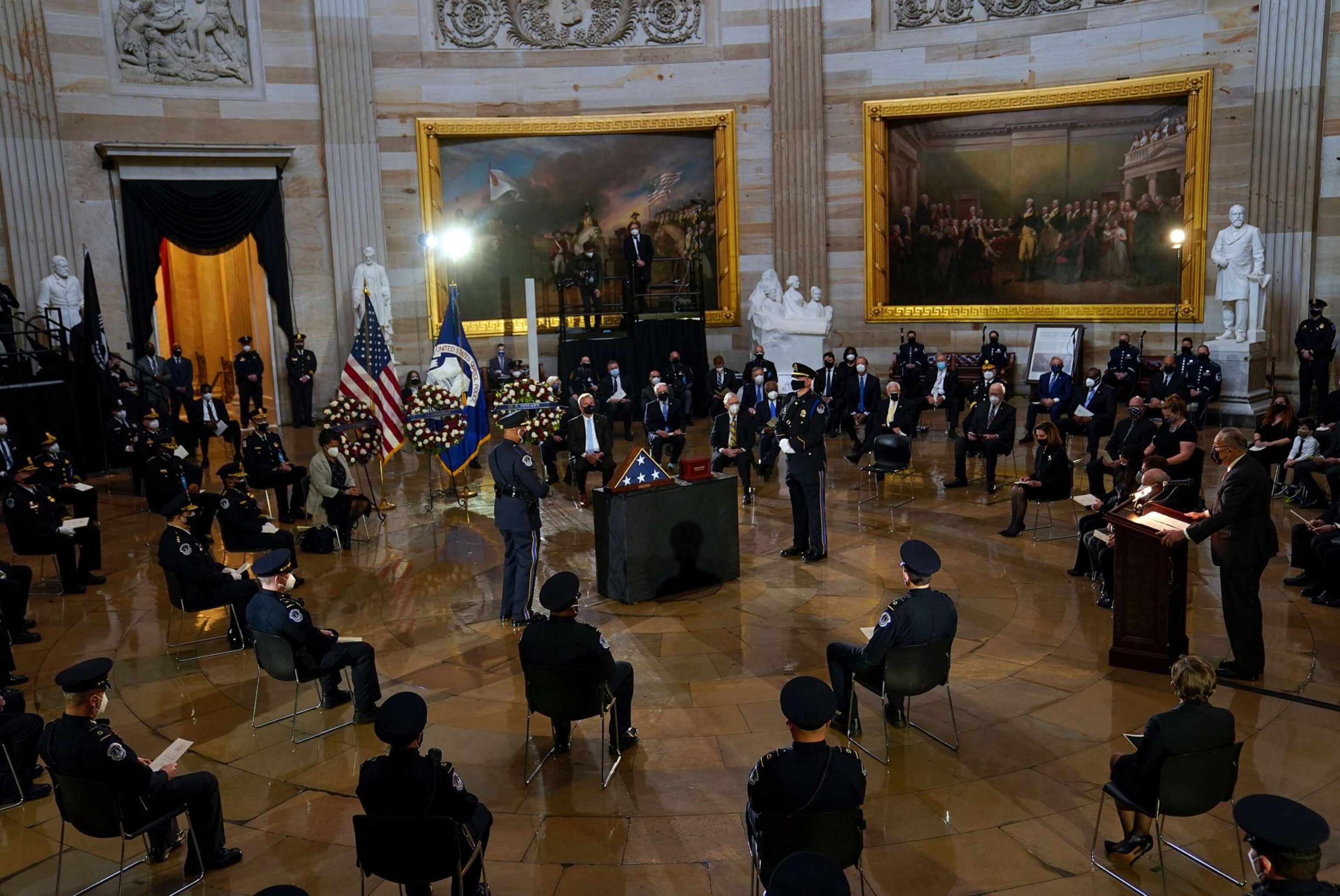 PHOTO: Senator Chuck Schumer (D-NY), far right, speaks during the Congressional ceremony memorializing U.S. Capitol Police Officer Brian D. Sicknick, 42, as he lies in honor in the Rotunda of the Capitol, Feb. 3, 2021, in Washington.