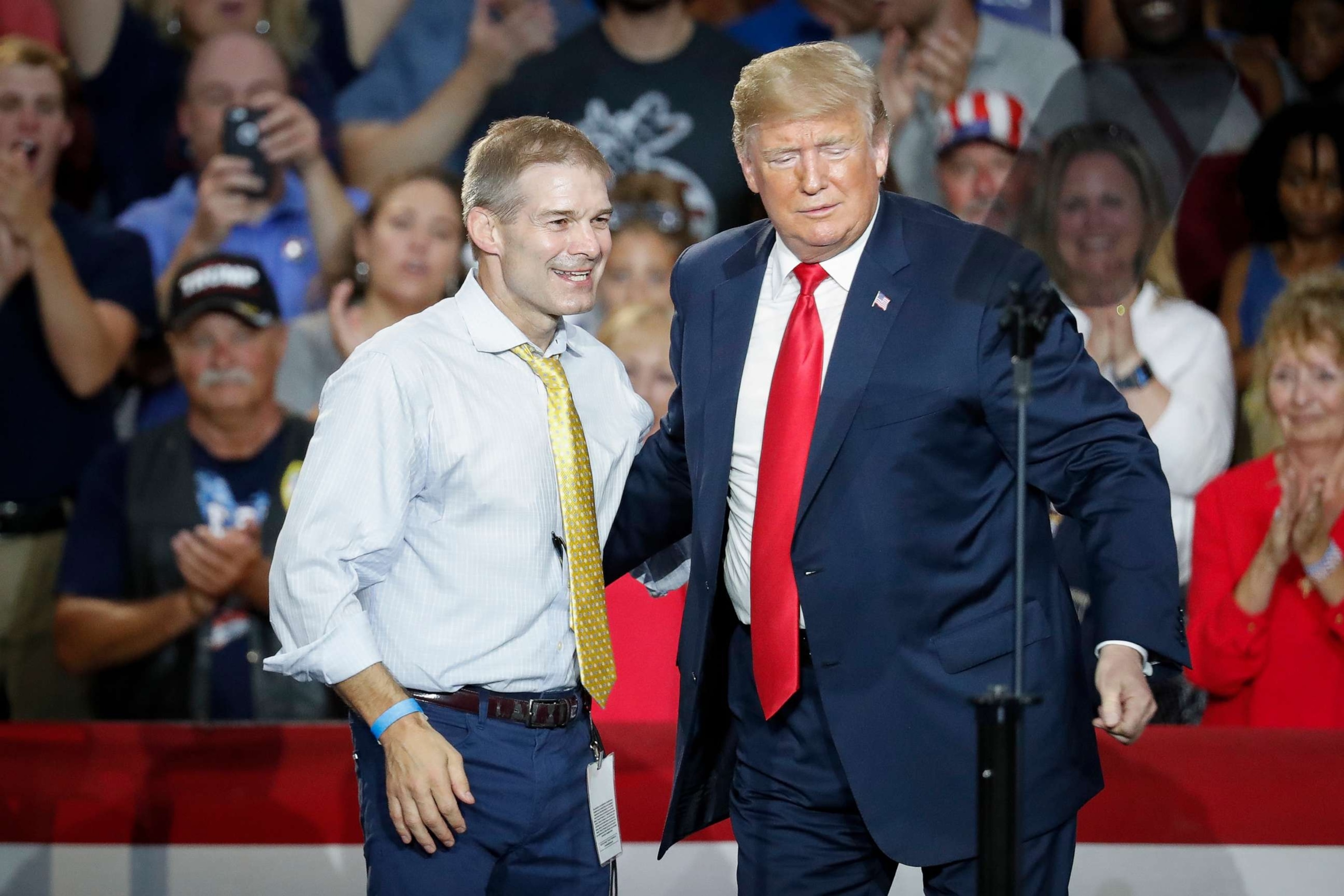 PHOTO: Then-President Donald Trump, right, encourages Rep. Jim Jordan, R-Ohio, left, to speak during a rally, Aug. 4, 2018, in Lewis Center, Ohio.