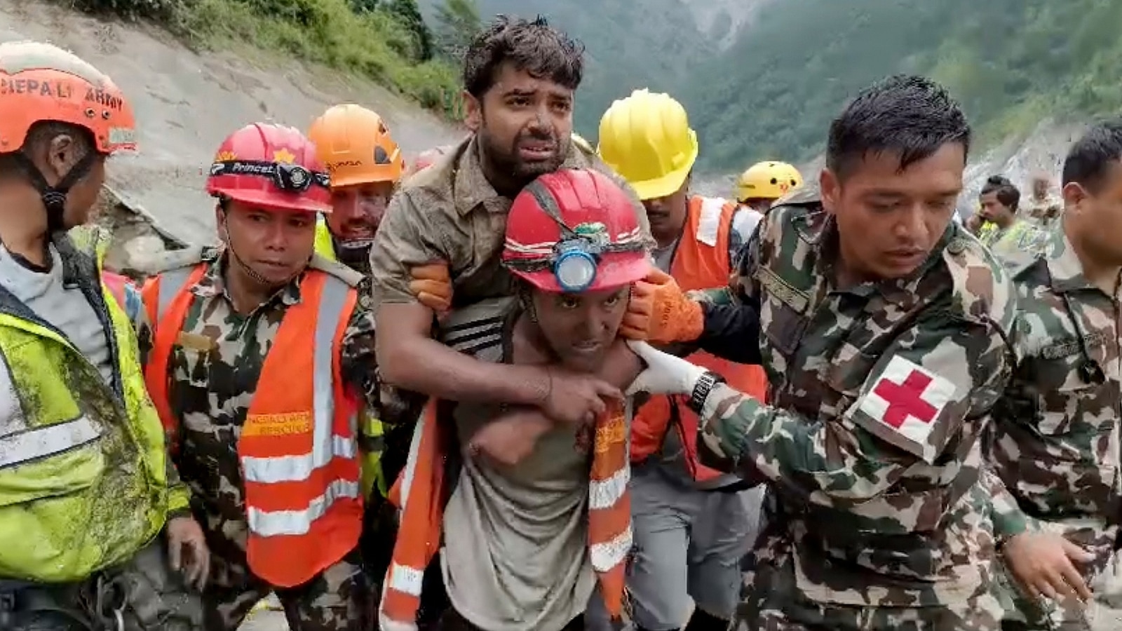 Rescuers in Nepal have pulled two workers alive from a hydropower tunnel, raising hopes of reaching a dozen others believed to be trapped nine days after catastrophic floods devastated towns and swept away villages. Read more: