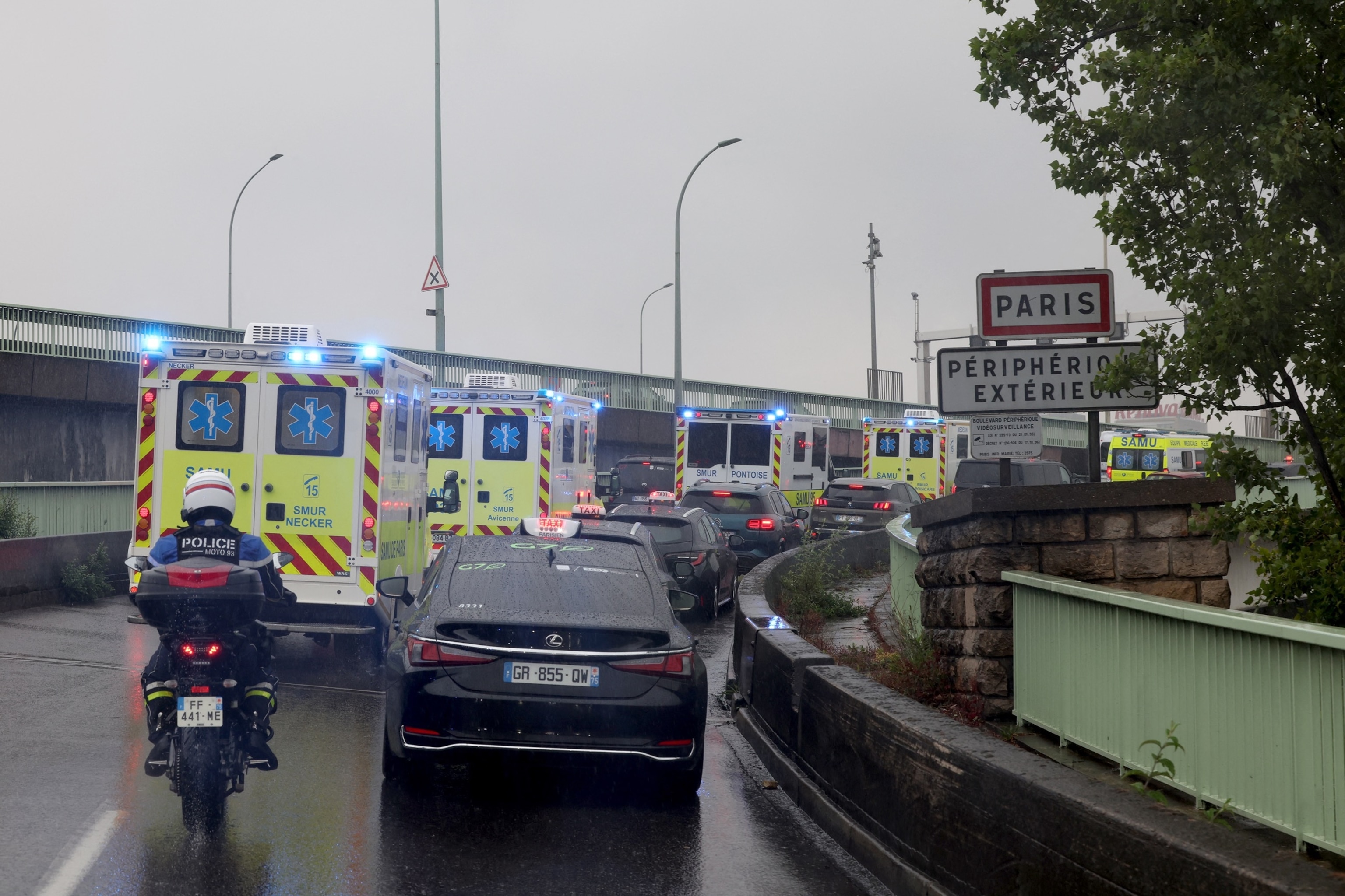 PHOTO: Ambulances transporting French national passengers of the MV Hondius, where an outbreak of hantavirus has been detected, drive in a tunnel enter Paris on May 10, 2026.