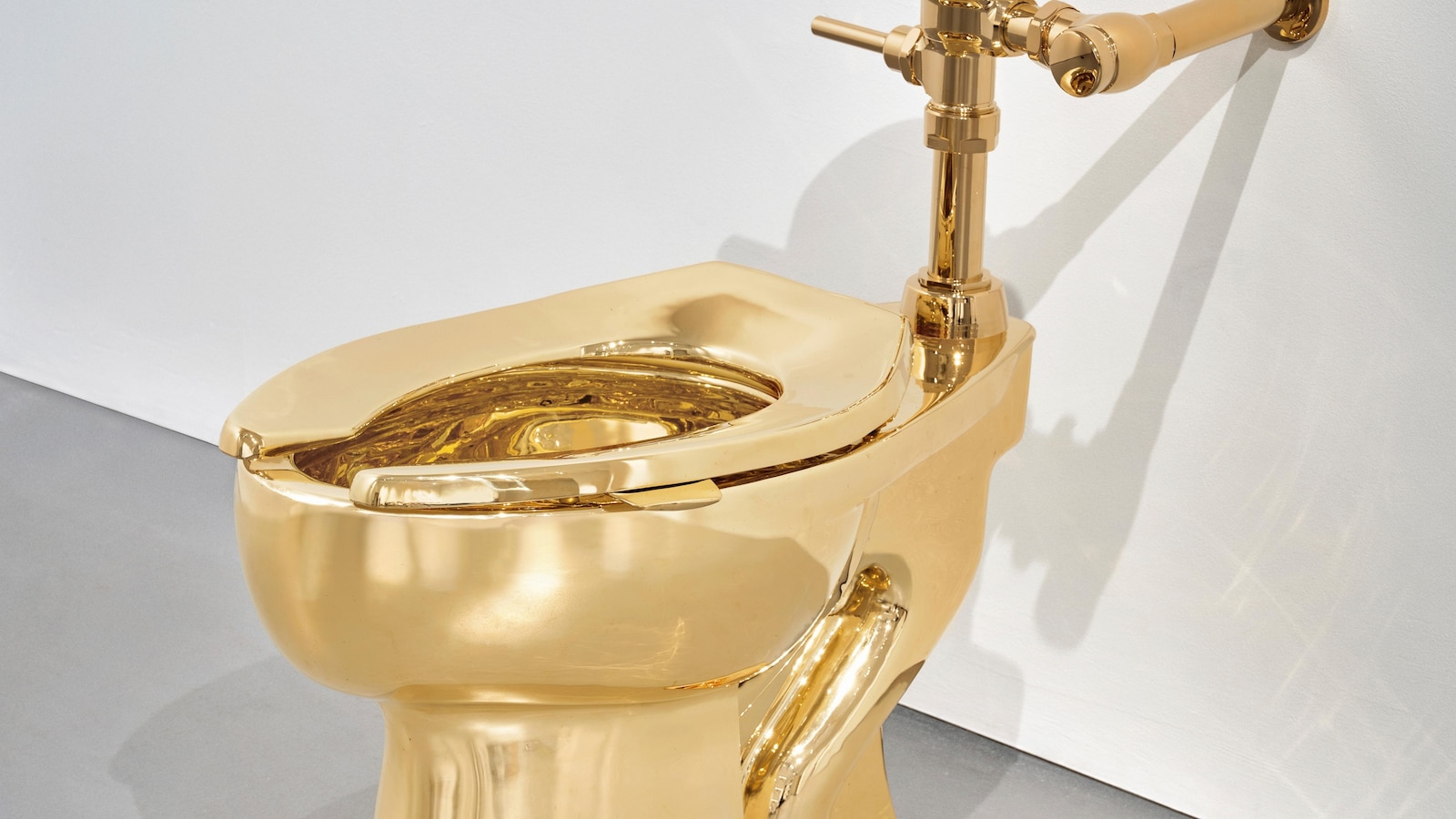 A solid gold toilet is up for auction with a $10 million starting price