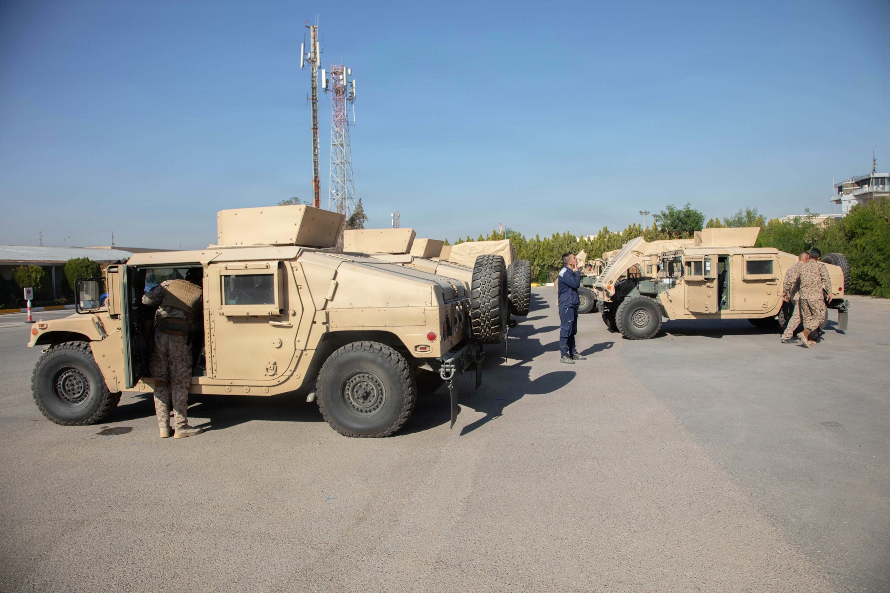 PHOTO: Iraqi Security Forces service members inspect the Humvee fleet divested by the Counter-ISIS Training and Equip Fund (CTEF) during a Humvee divestment at Erbil Air Base, Iraq, Nov. 24, 2025. 