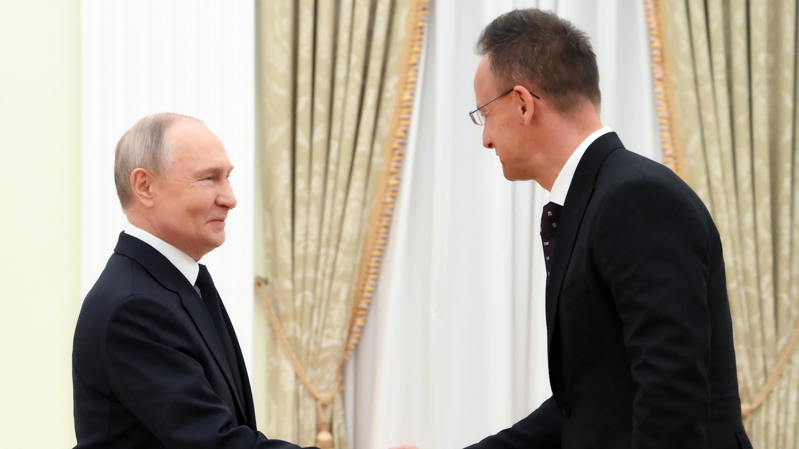 Putin hosts Hungary's foreign minister for energy supply talks as war in Mideast causes disruptions