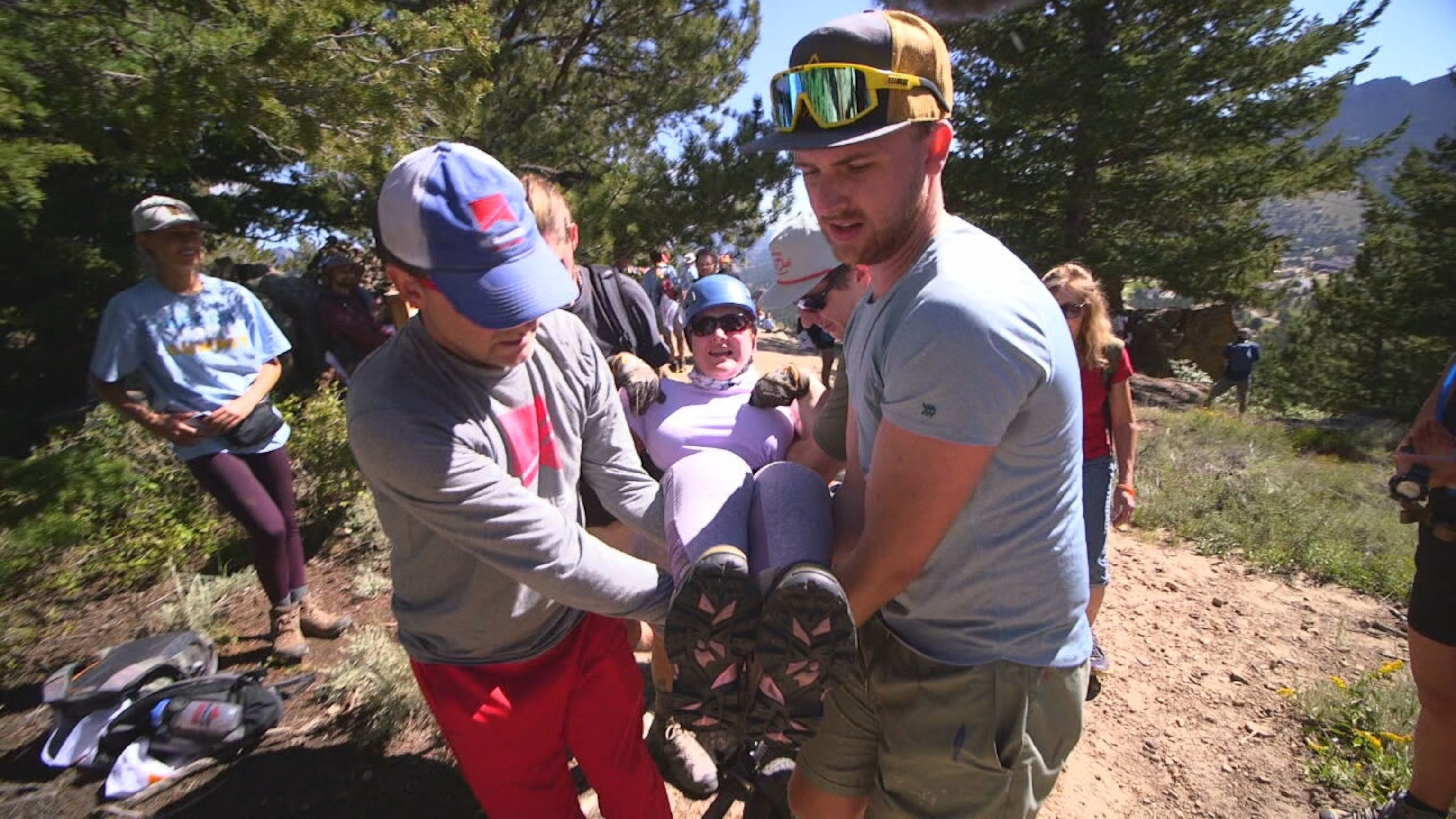 PHOTO: No Barriers volunteers carry Melissa Simpson, a woman with cerebral palsy, to the top of a mountain.