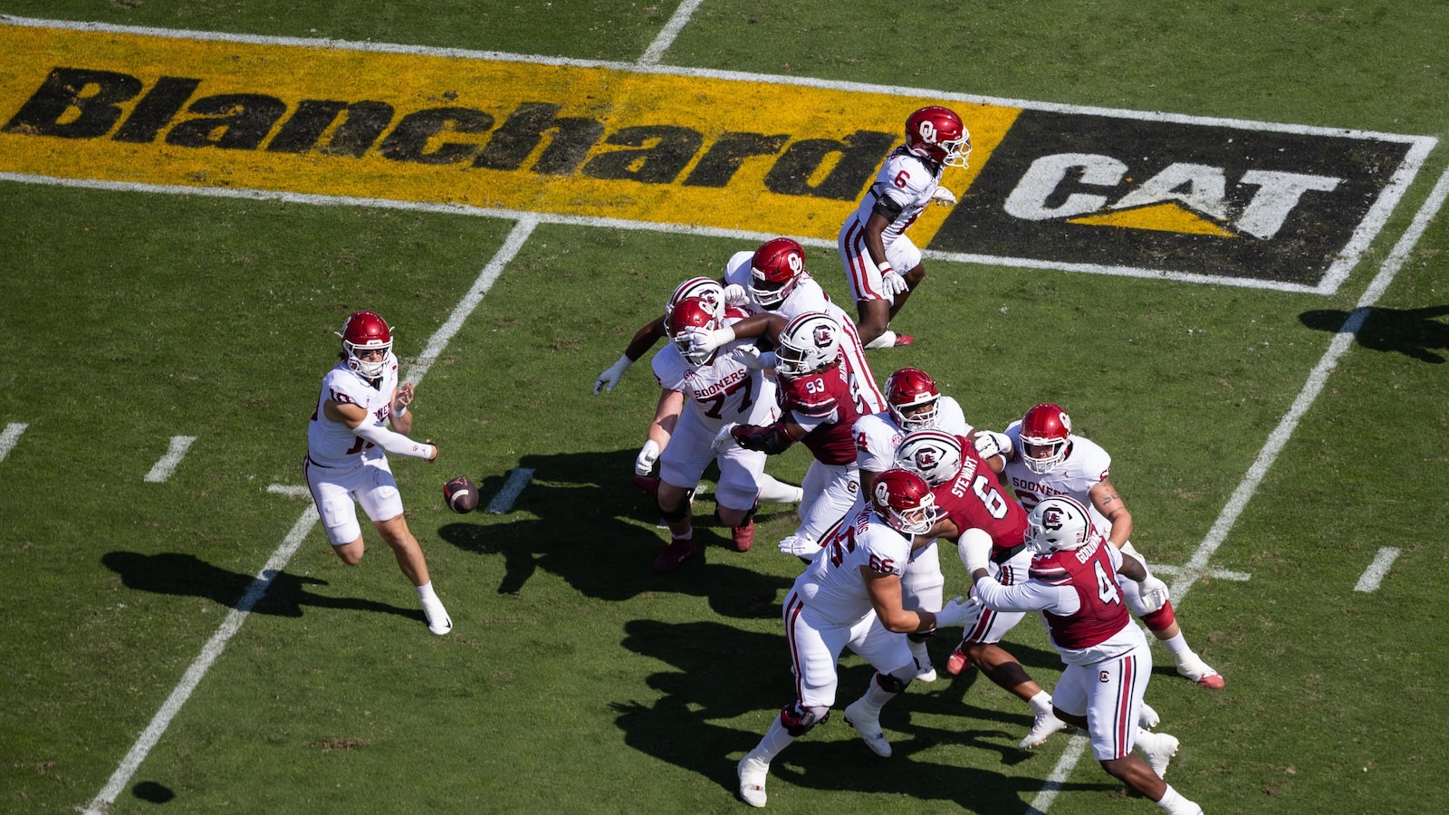 Schools adding corporate gridiron ads to level revenue-sharing playing field
