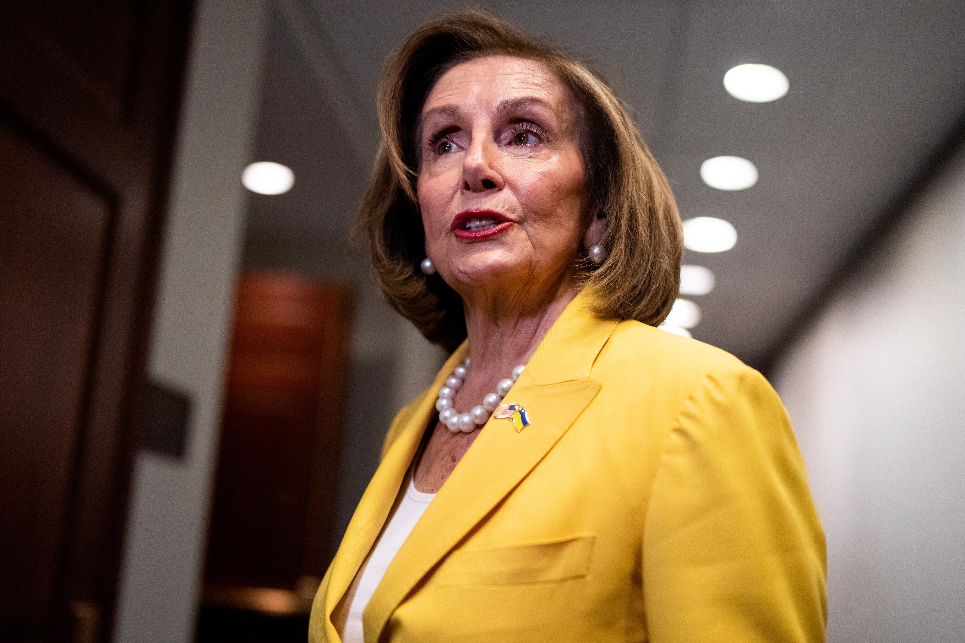 PHOTO: Rep. Nancy Pelosi, D-Calif., speaks with the media before a meeting of the House Democratic Caucus in the U.S. Capitol on July 18, 2023. 