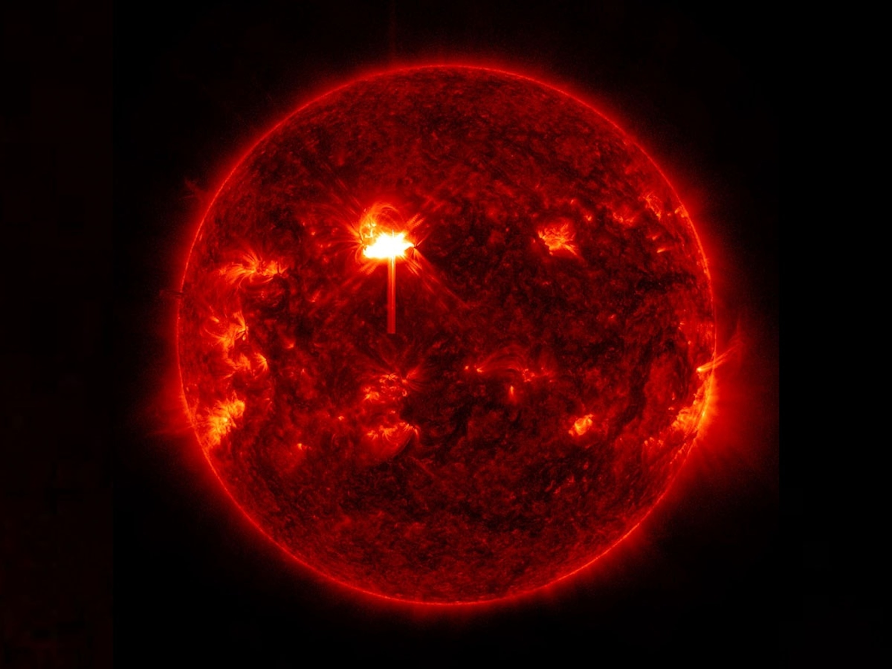PHOTO: NASA’s Solar Dynamics Observatory captured this image of a solar flare — seen as the bright flash in the Sun’s upper half — on Feb. 3, 2026.
