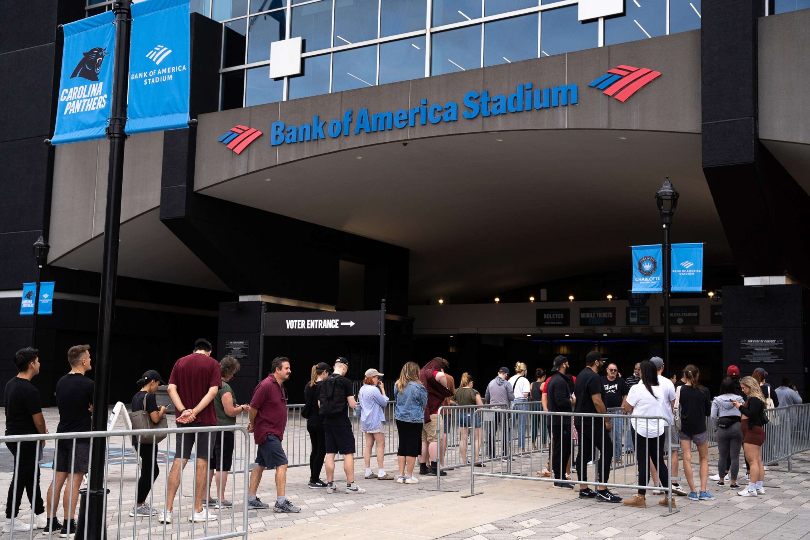 PHOTO: People wait in line to vote at Bank of America Stadium, Nov. 5, 2022, in Charlotte, N.C.