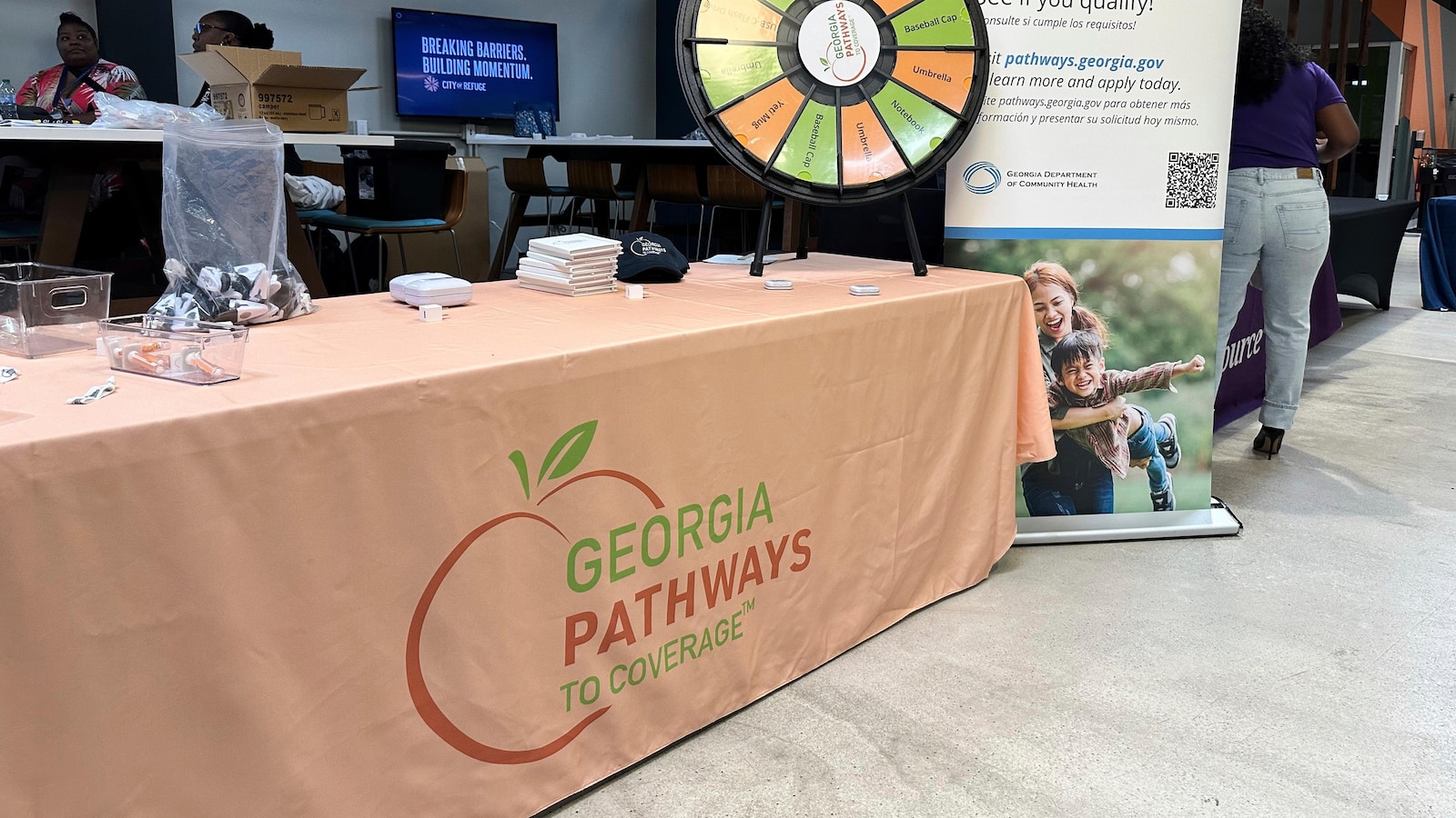 US applications for jobless benefits fall to 205,000 last week as layoffs remain historically low.