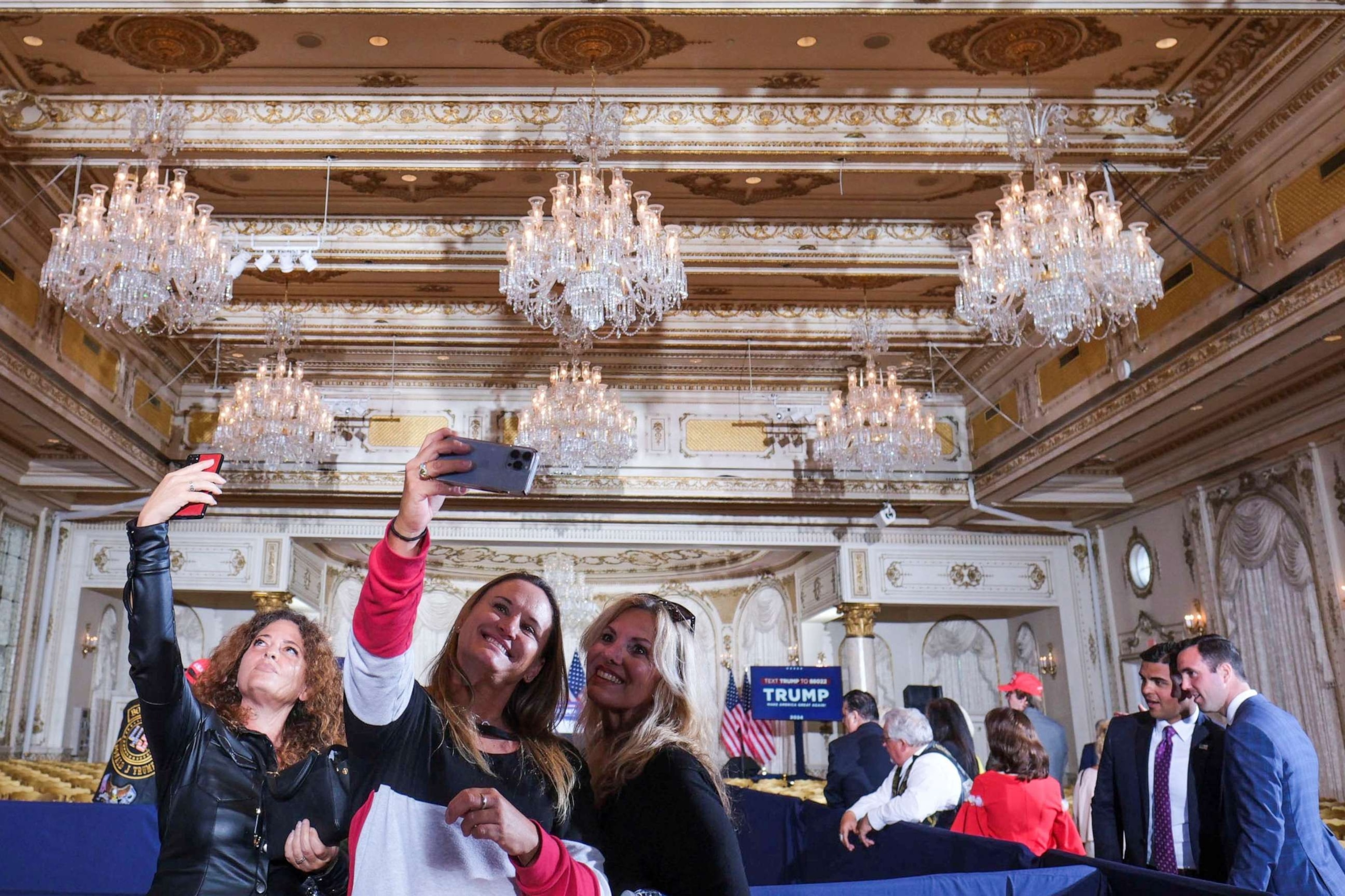 PHOTO: Women take selfies at Mar-a-Lago resort in Palm Beach, Florida, Apr. 4, 2023.