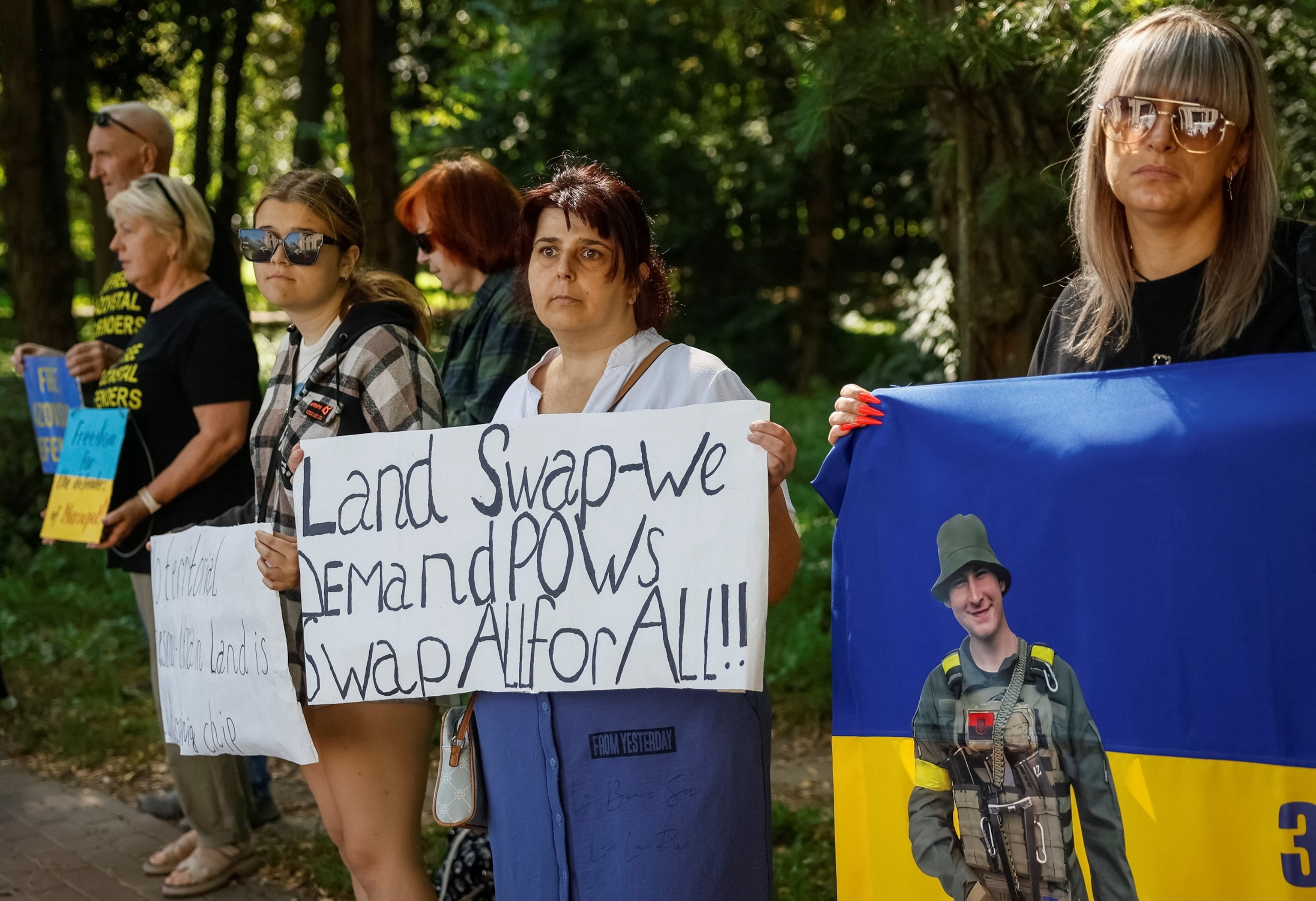PHOTO: Activists take part in a rally in front of the U.S. embassy ahead of the upcoming meeting between Donald Trump and Russian President Vladimir Putin in Kyiv, Ukraine August 15, 2025.