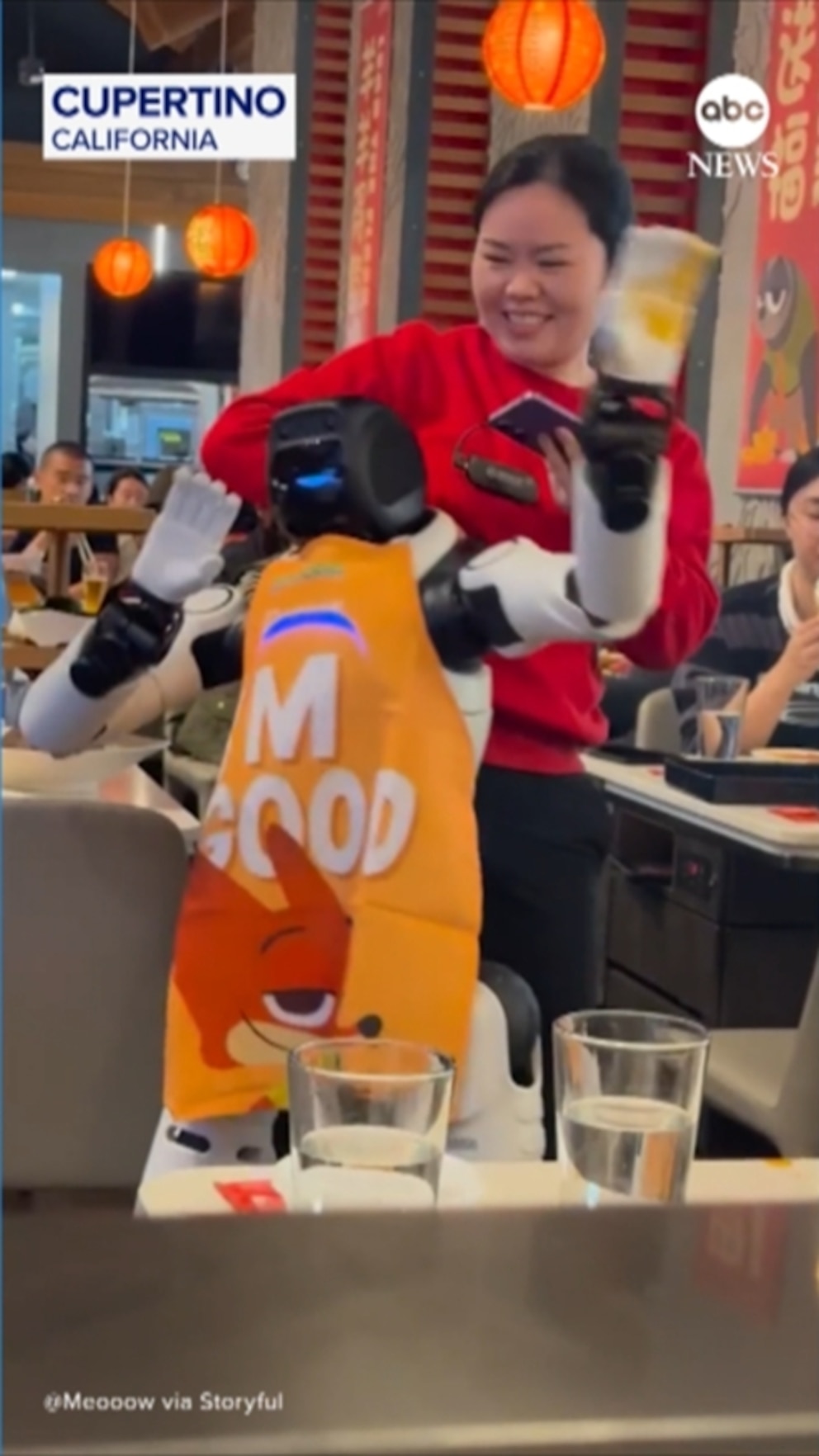Video Dancing robot gets too funky, has to be restrained